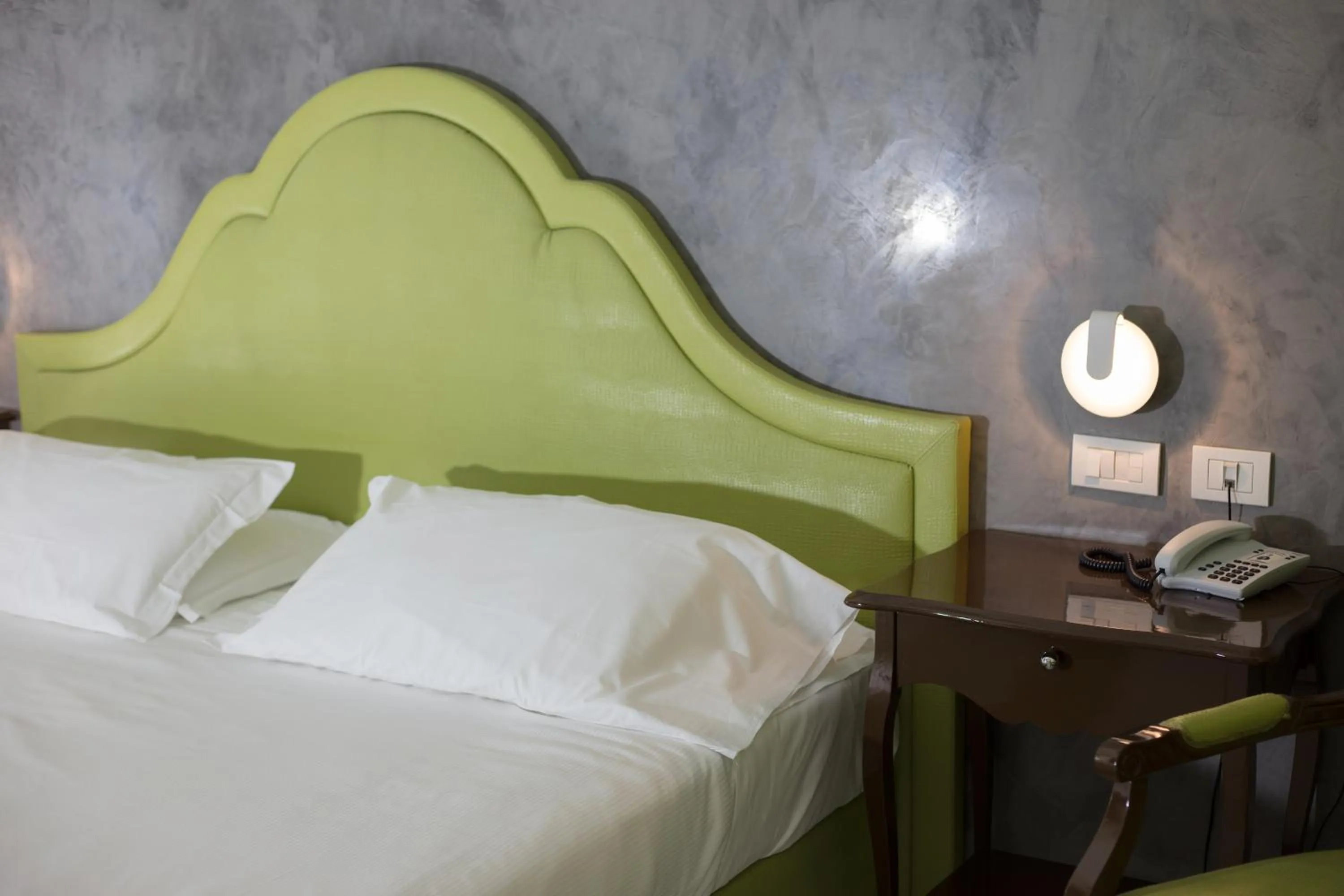 Bed in Blue Relais Maggiore