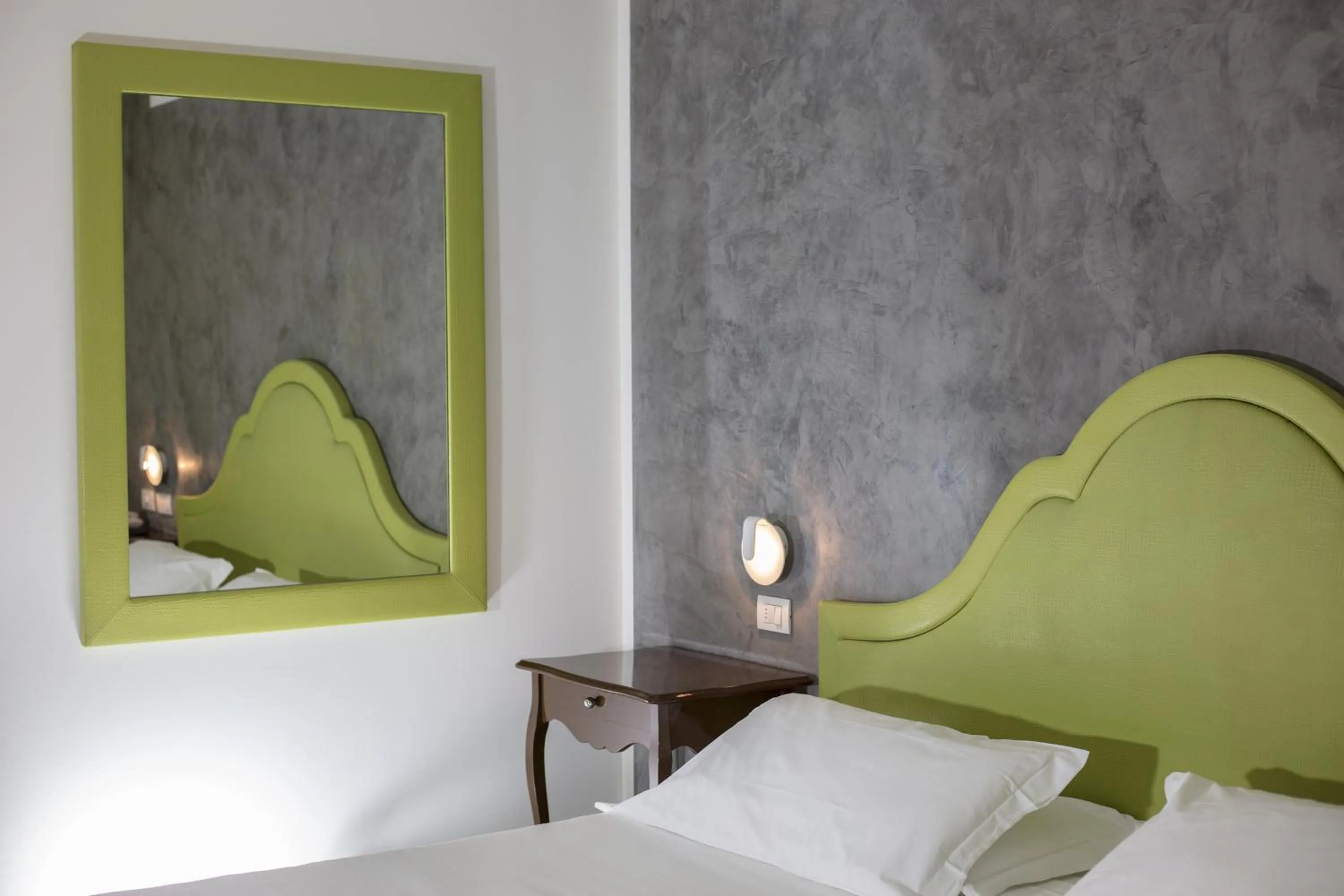 Bed in Blue Relais Maggiore