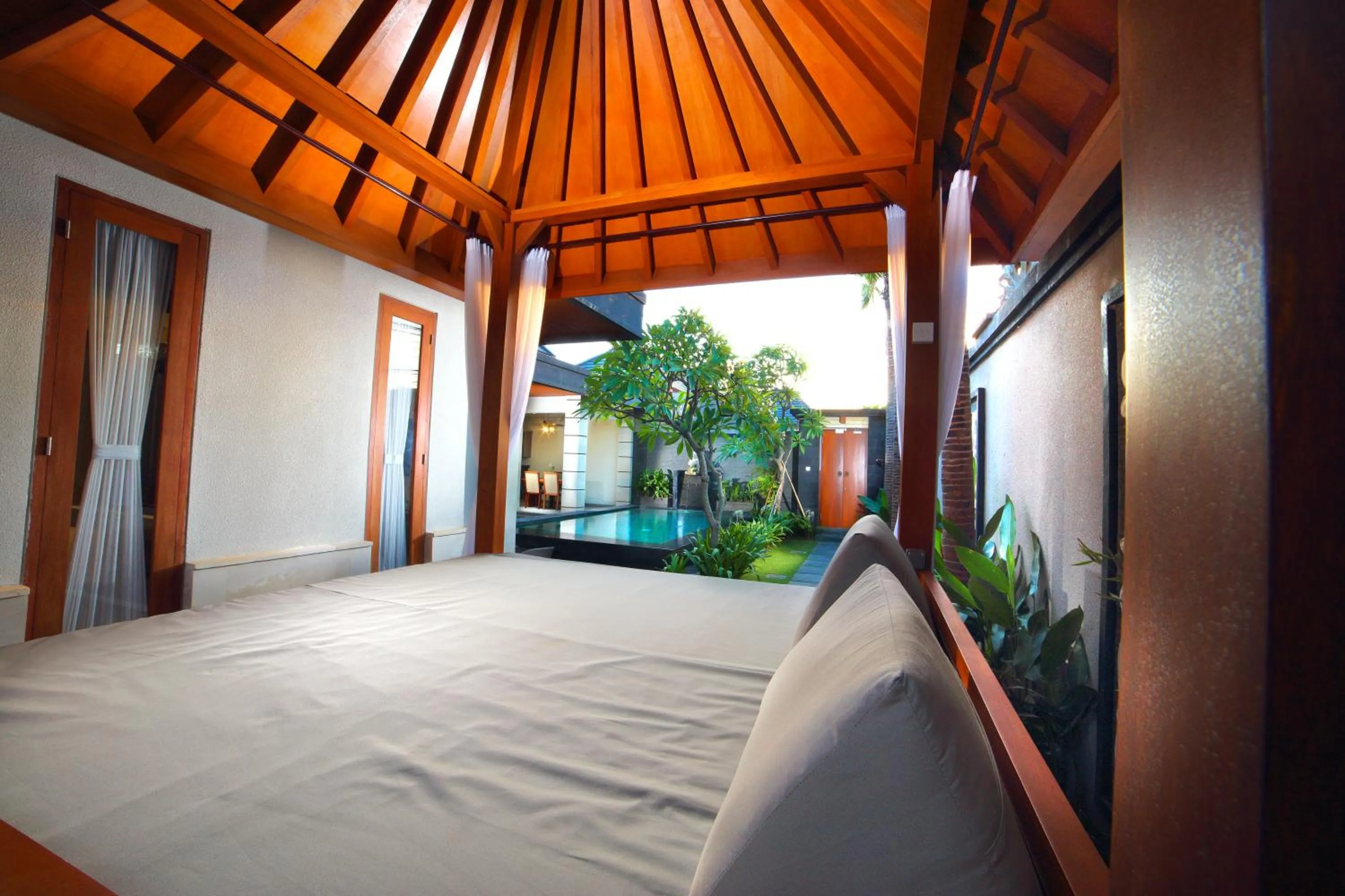 Living room, Bed in The Banyumas Suite Villa Legian