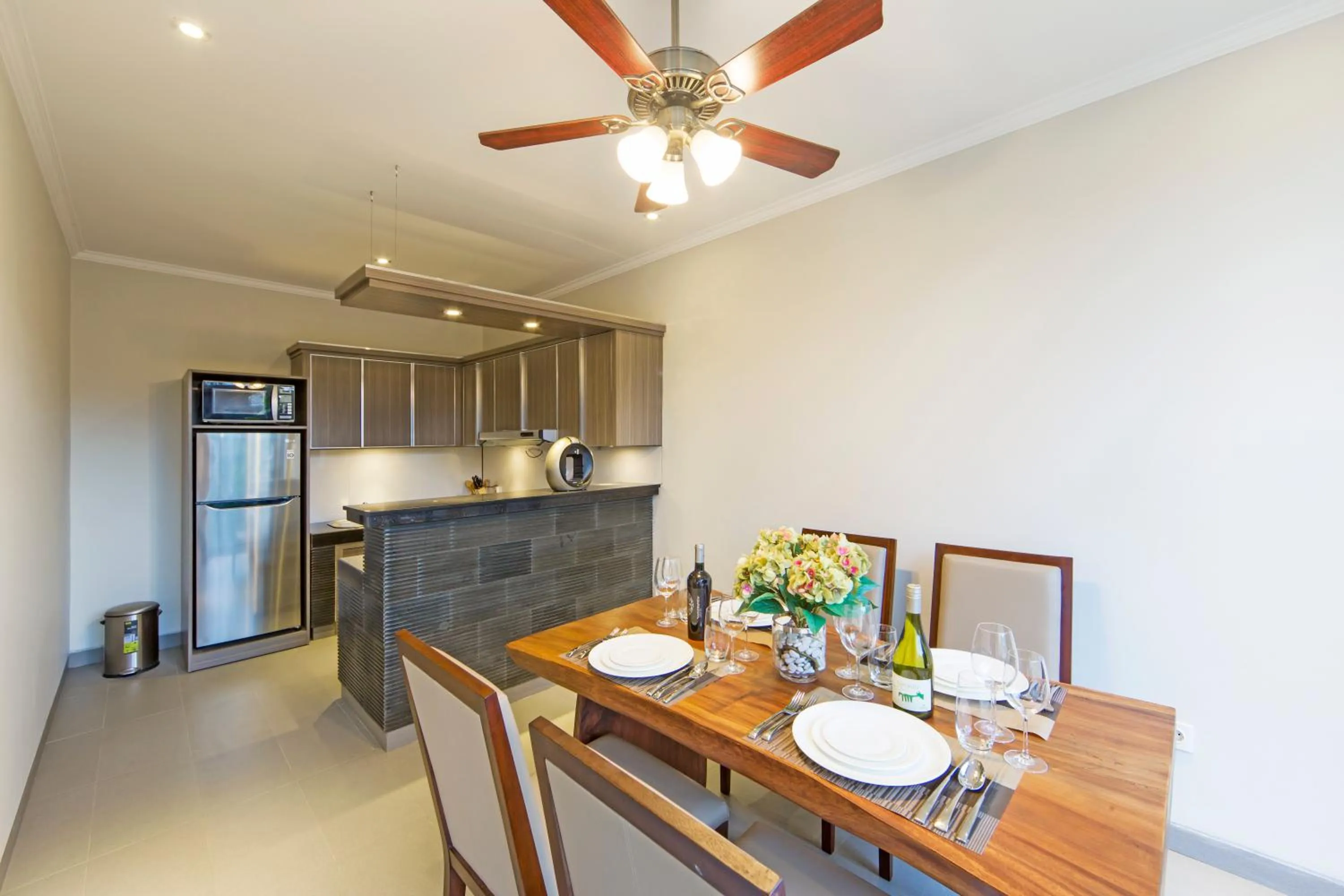 Kitchen or kitchenette in The Banyumas Suite Villa Legian