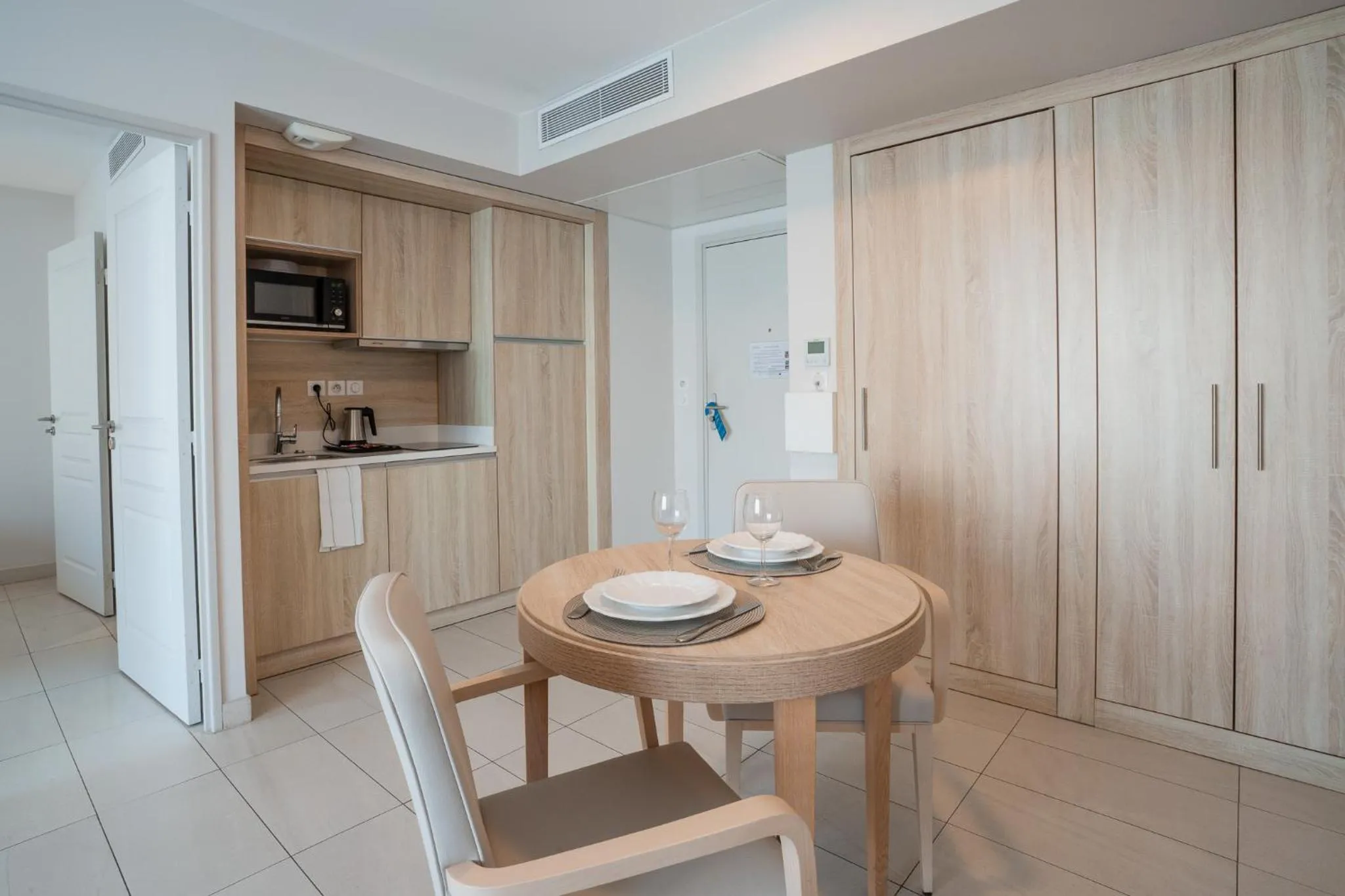 Kitchen or kitchenette in Zenitude Quality Aparthotel Nice