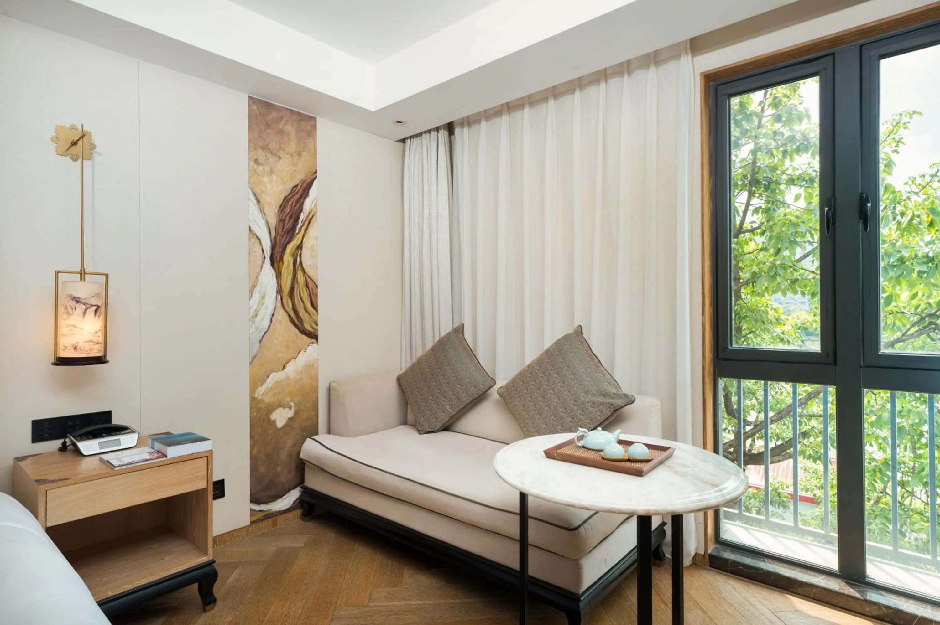 Seating area, Bed in LN Hotel Five