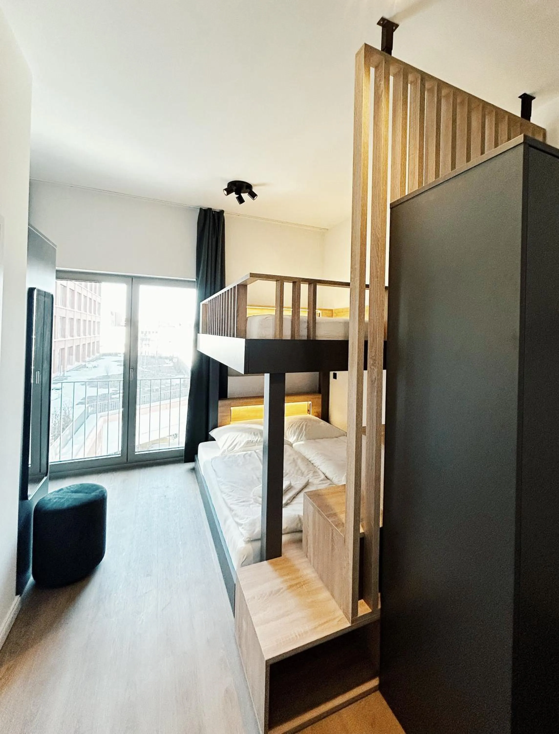 Bedroom, Bed in Homaris Apartments Winterhude