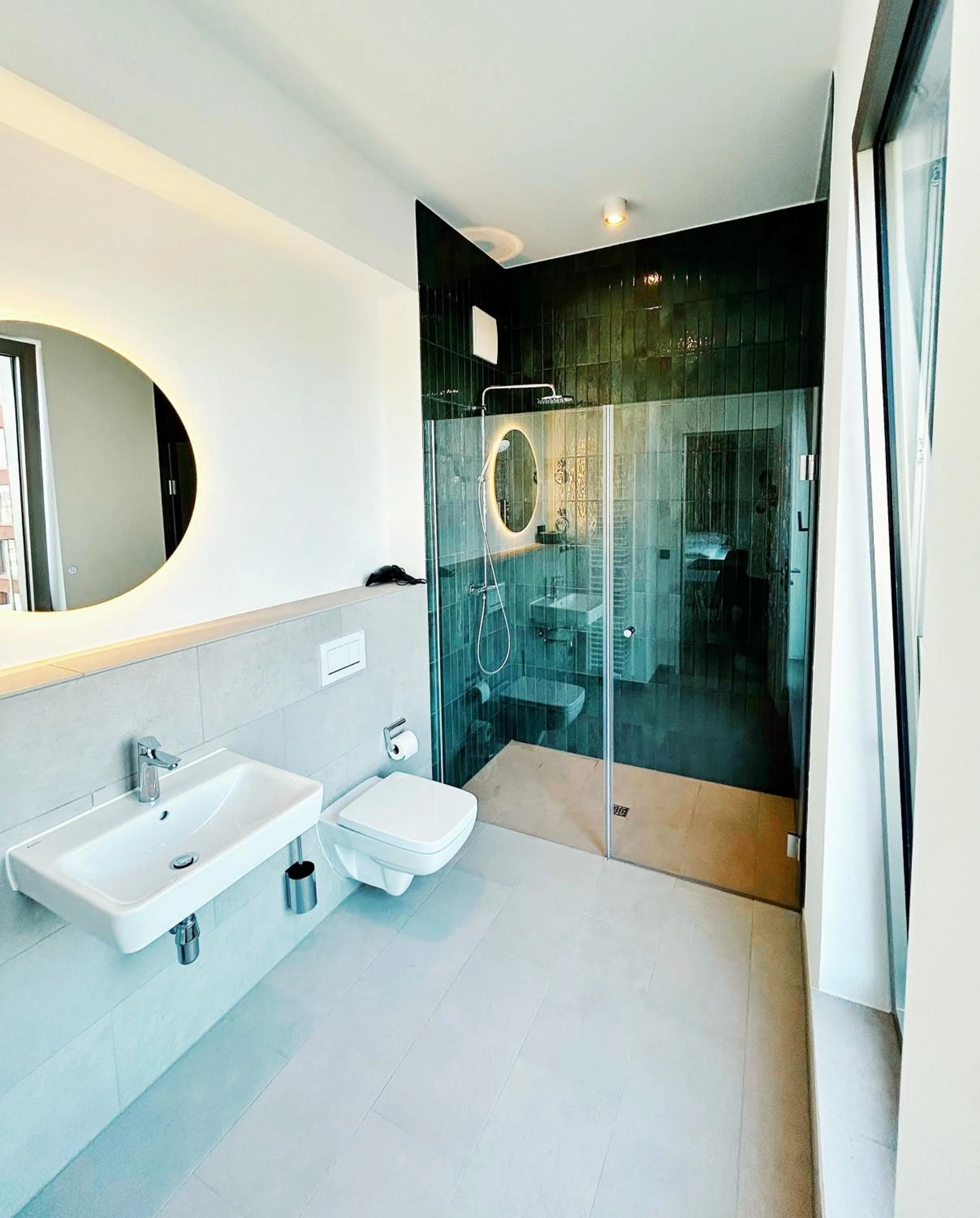 Shower in Homaris Apartments Winterhude