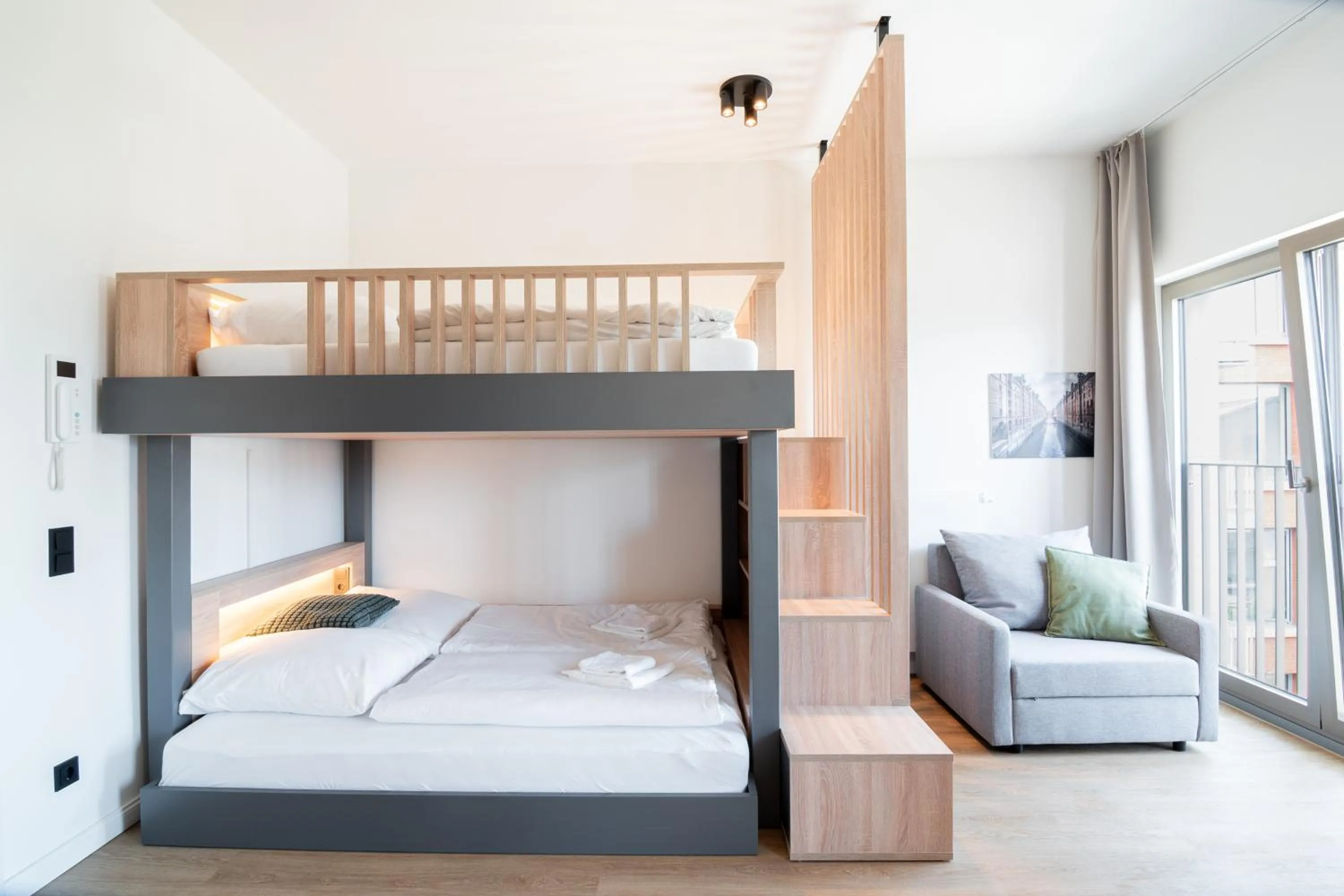 Bed in Homaris Apartments Winterhude