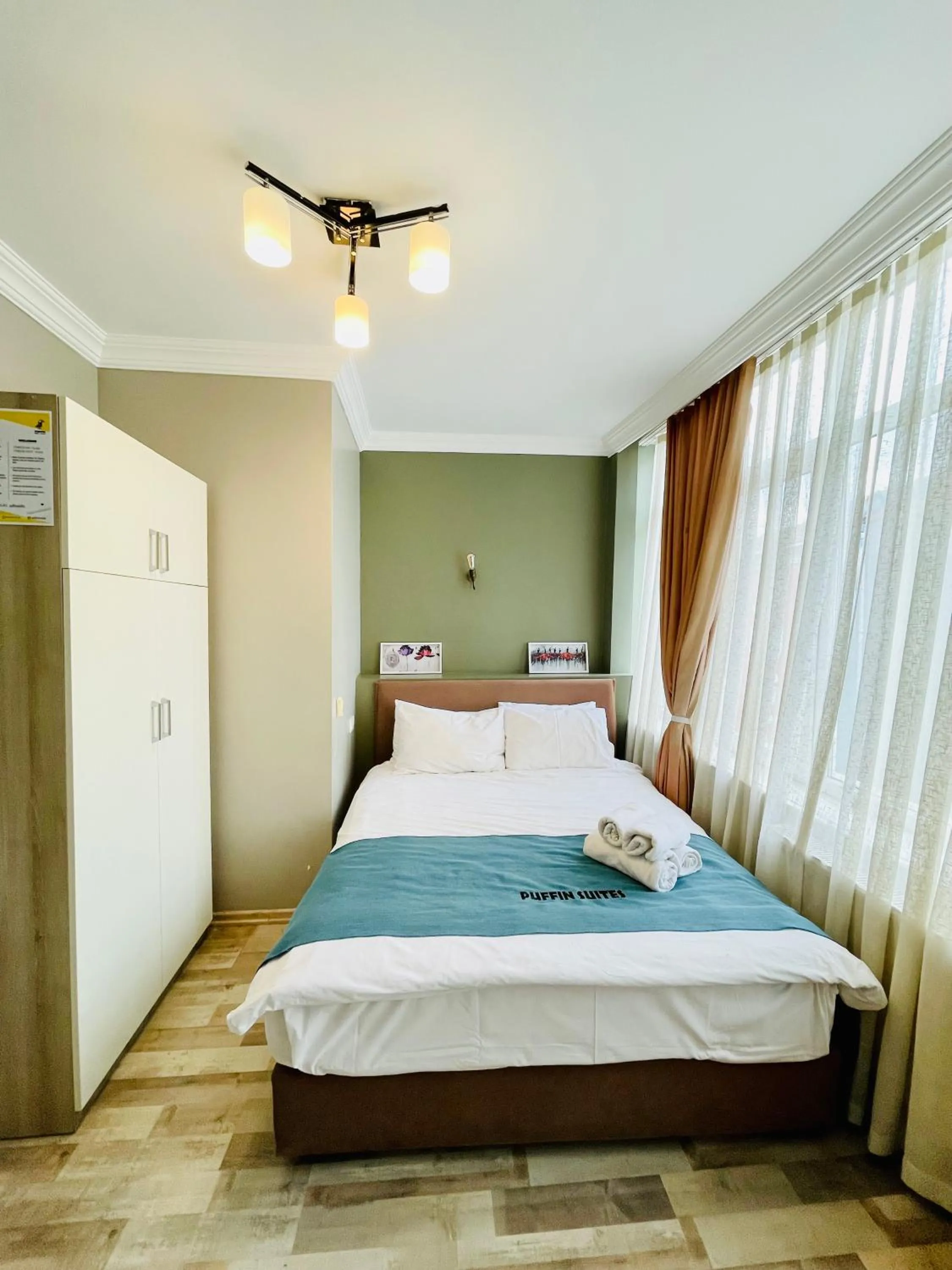 Bed in Puffin Suites