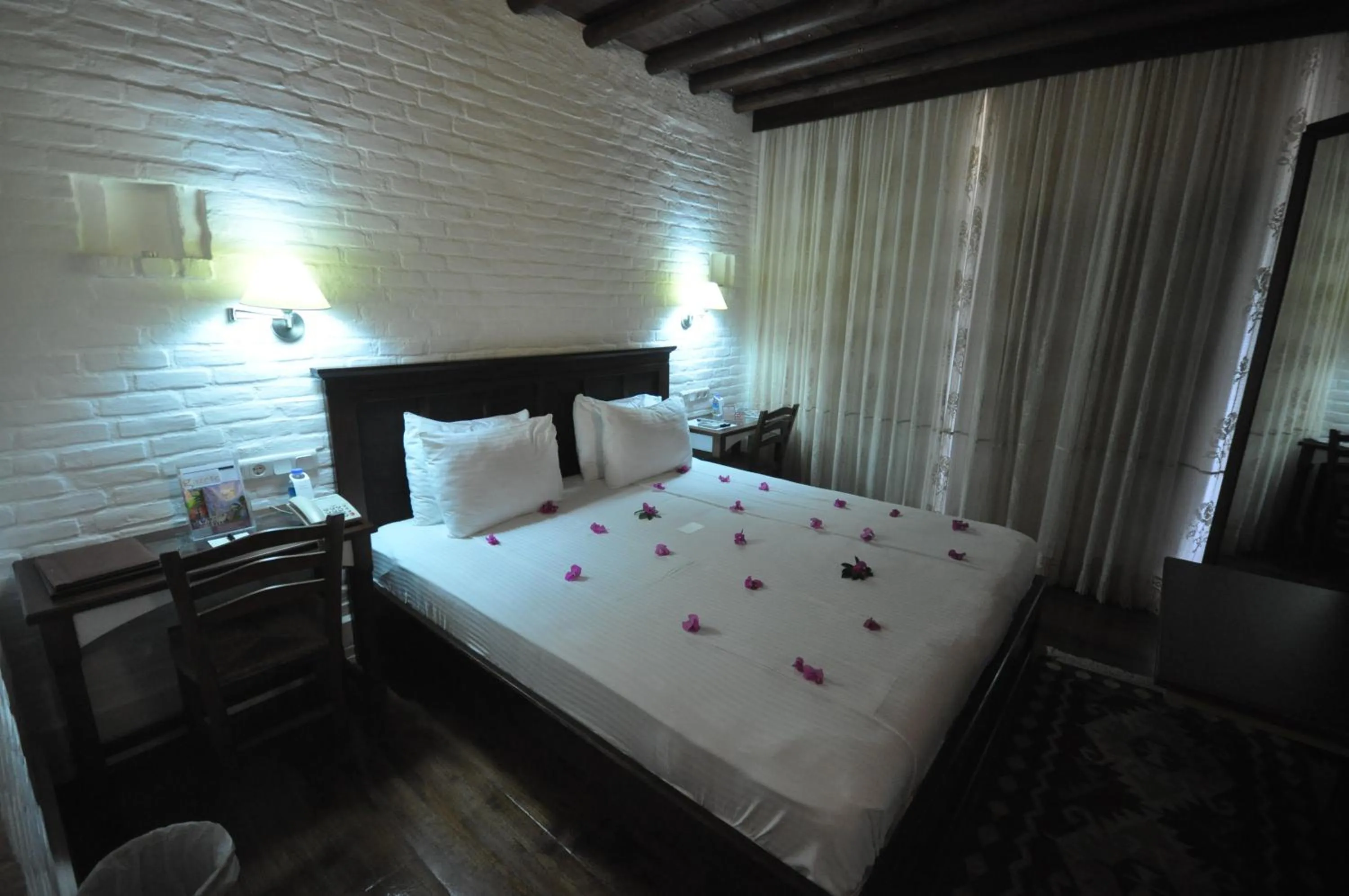 Photo of the whole room, Bed in El Vino Hotel & Suites
