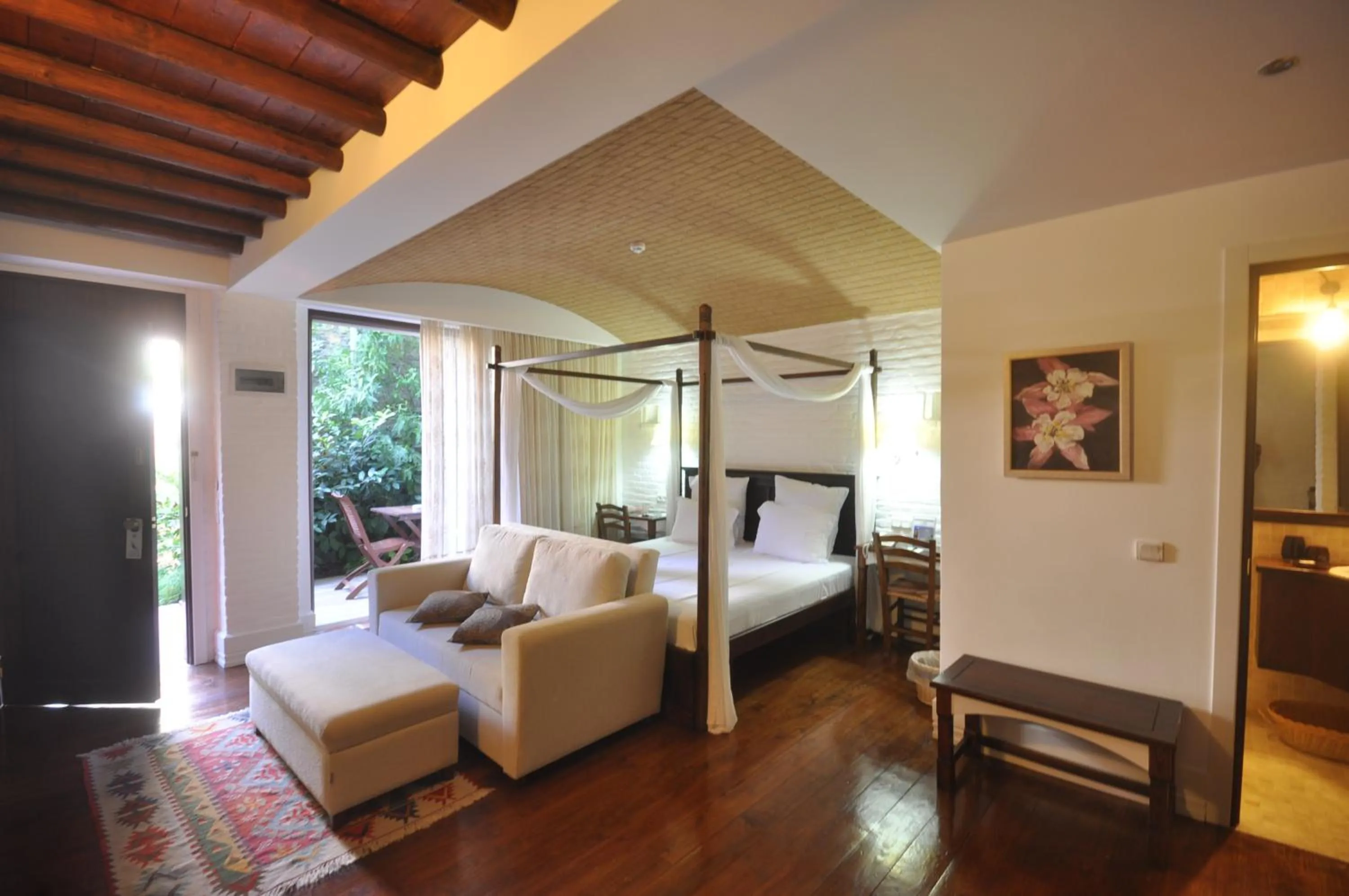 Photo of the whole room, Bed in El Vino Hotel & Suites