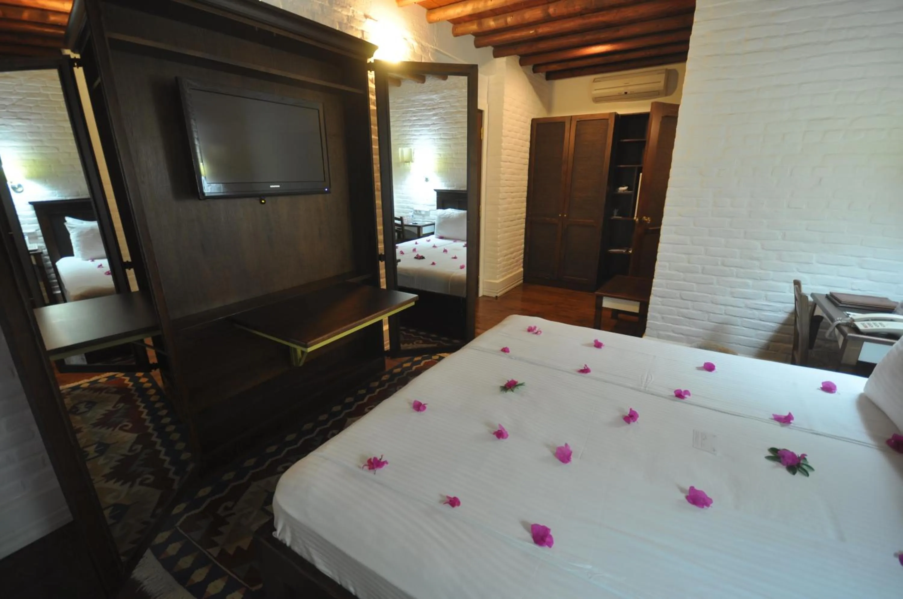 Photo of the whole room, Bed in El Vino Hotel & Suites