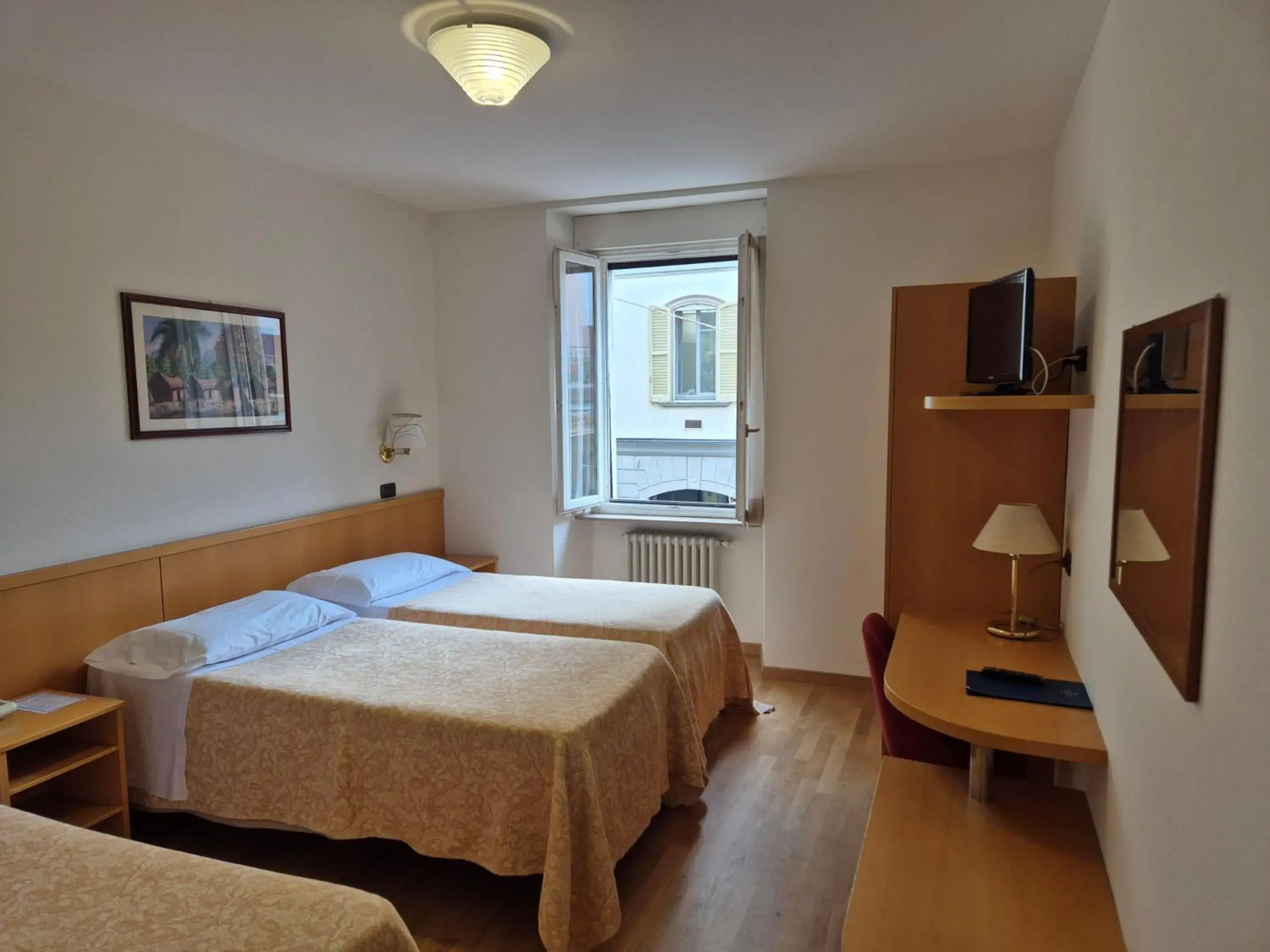 Bed in Hotel Tre Re Bed in Hotel Tre Re