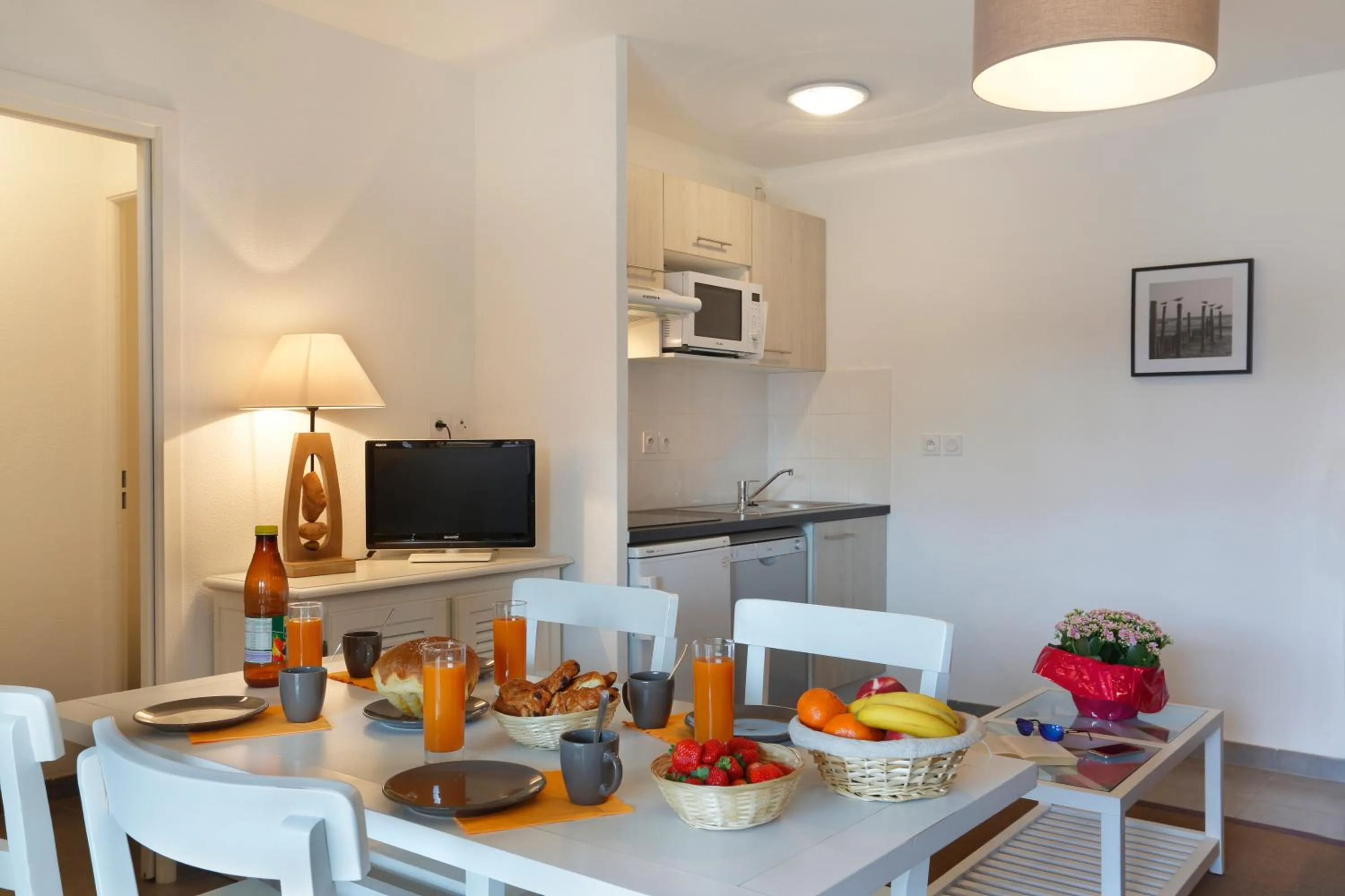 Kitchen or kitchenette in Résidence Néméa le Domaine des Dunes