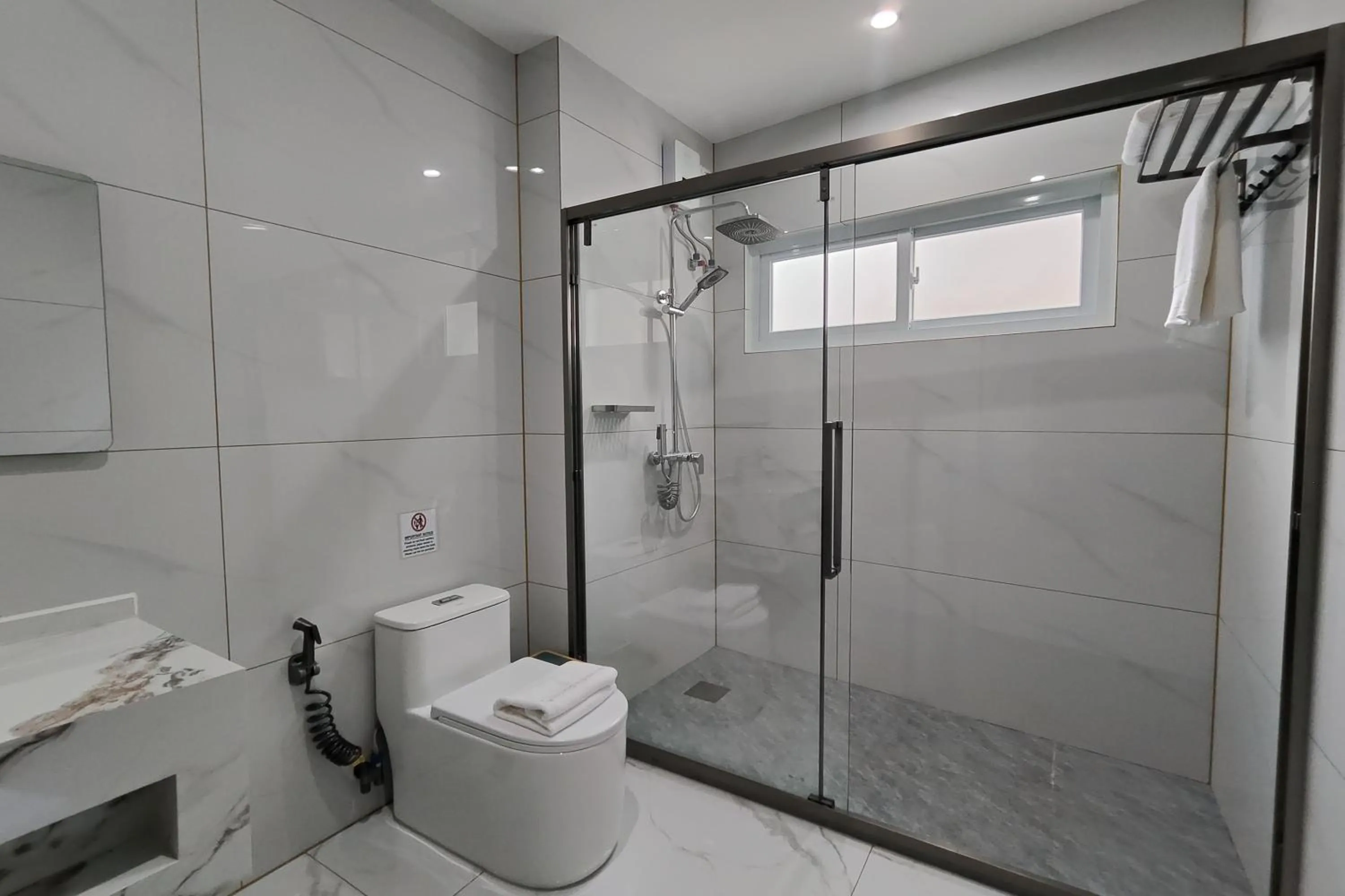 Bathroom in Mactan Grand Golden Hotel near Airport