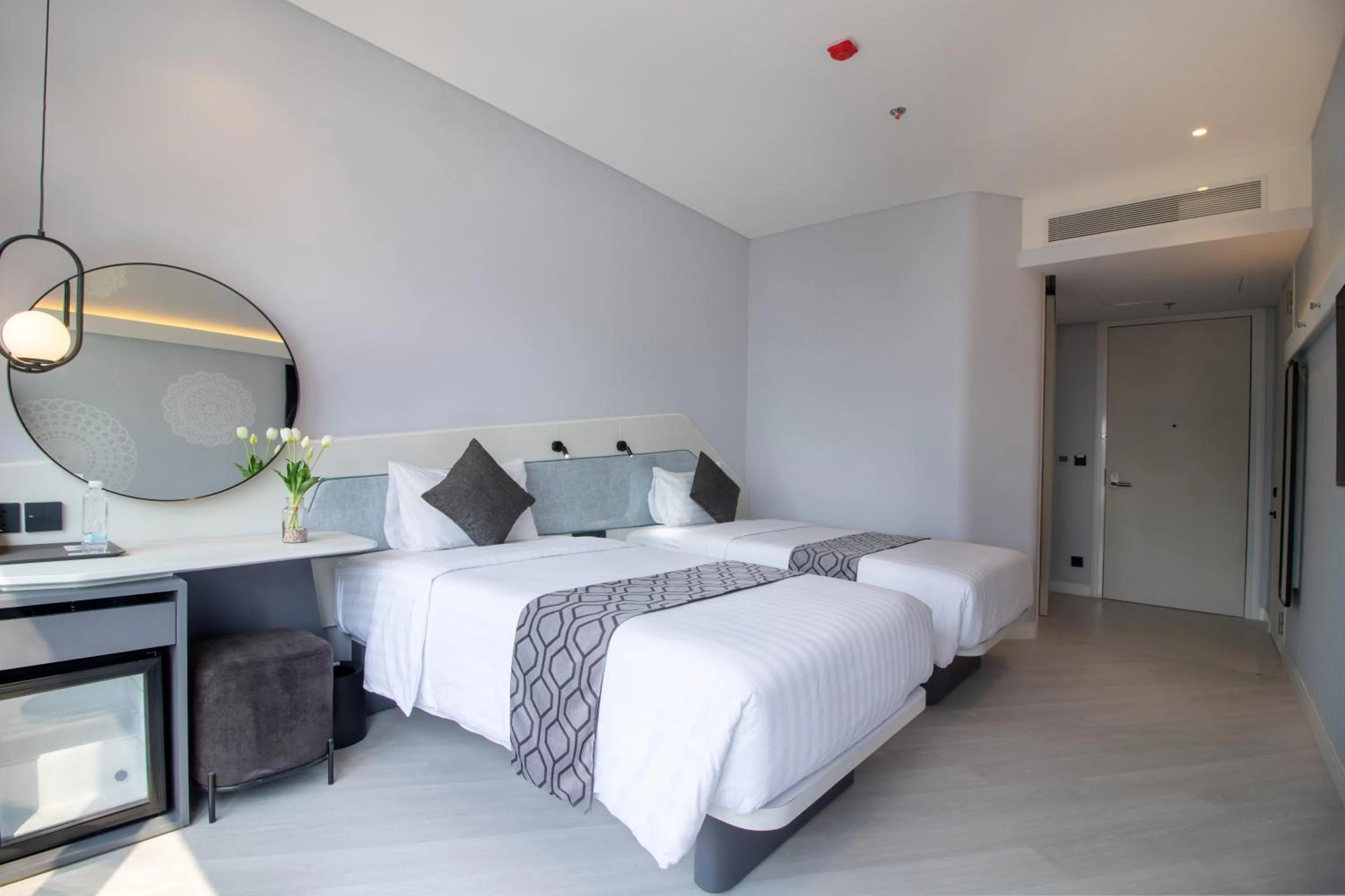 Bed in Queensland Hotel Bangkok