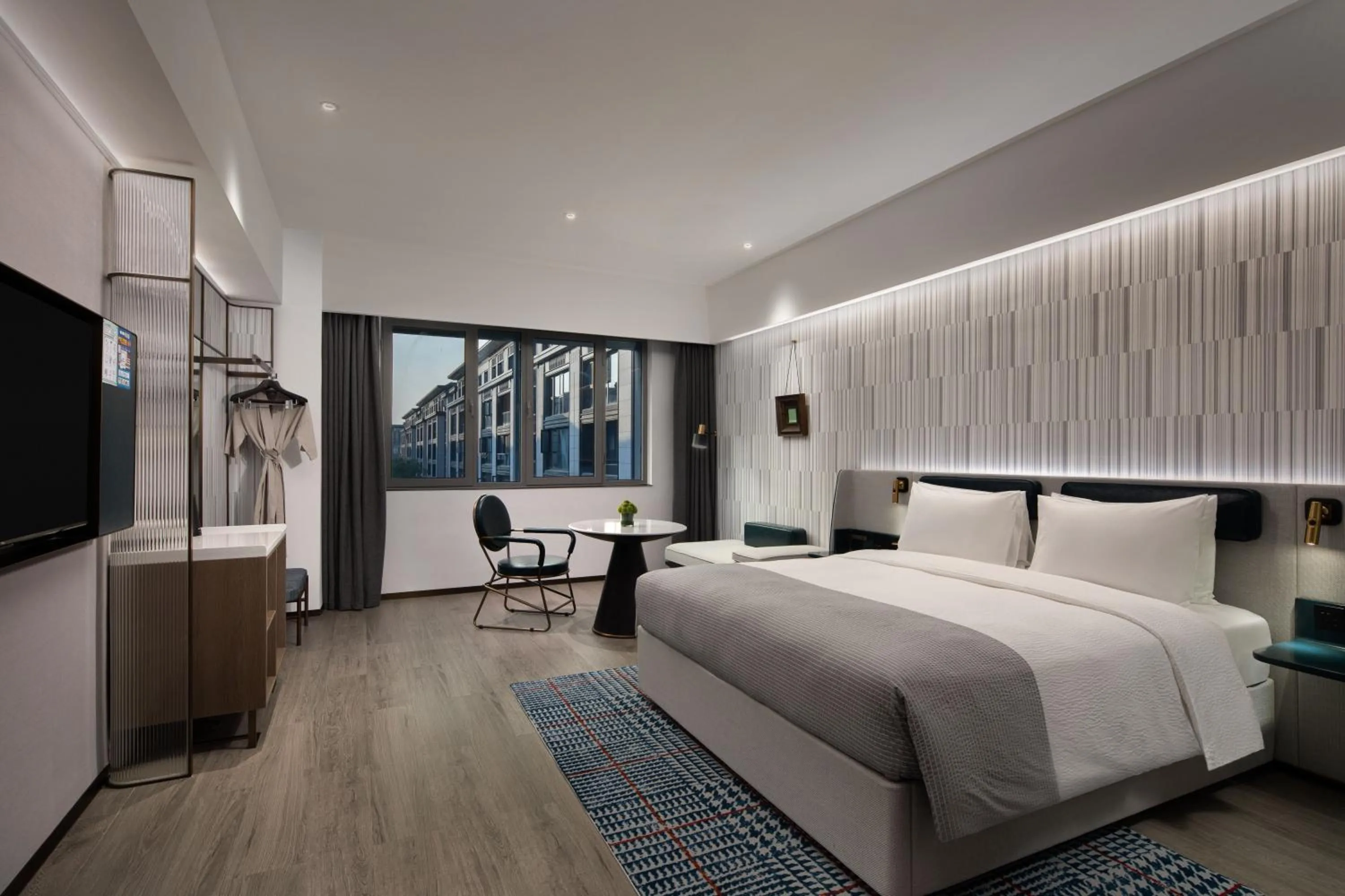 Photo of the whole room, Bed in Wanda Moments, Suzhou Science and Technology Town