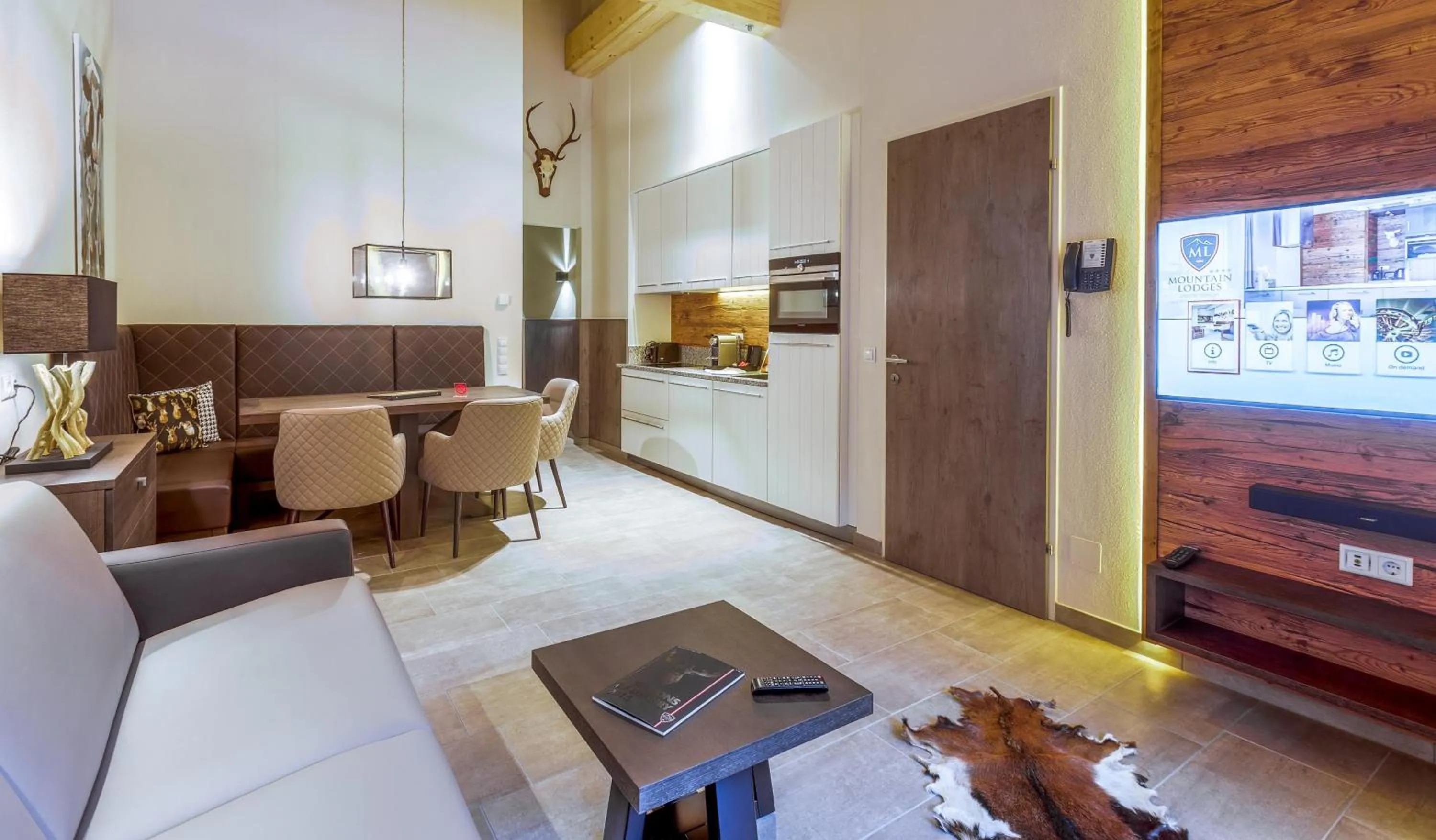 Kitchen or kitchenette in AvenidA Mountain Lodges Saalbach