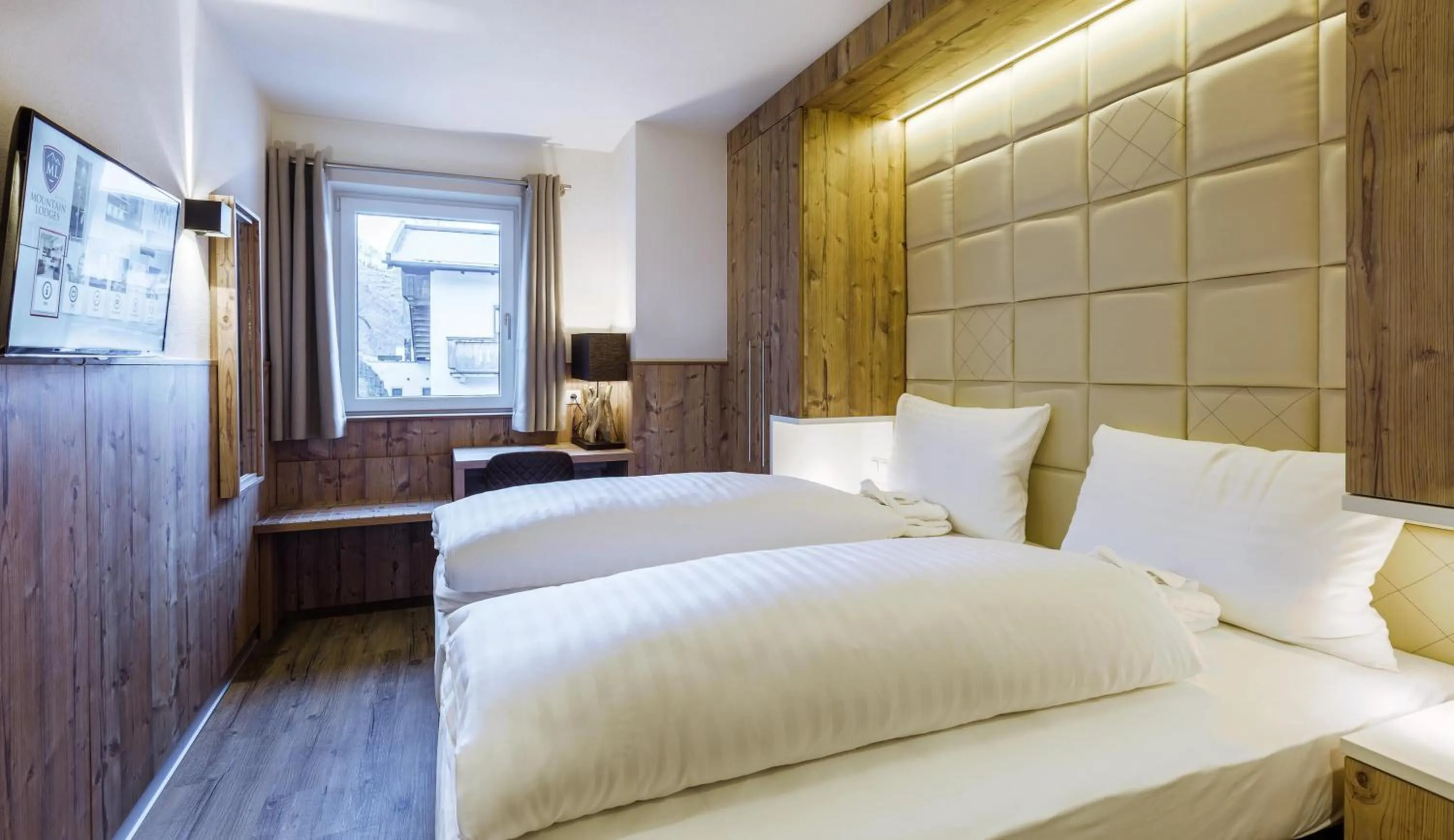 Bedroom, Bed in AvenidA Mountain Lodges Saalbach