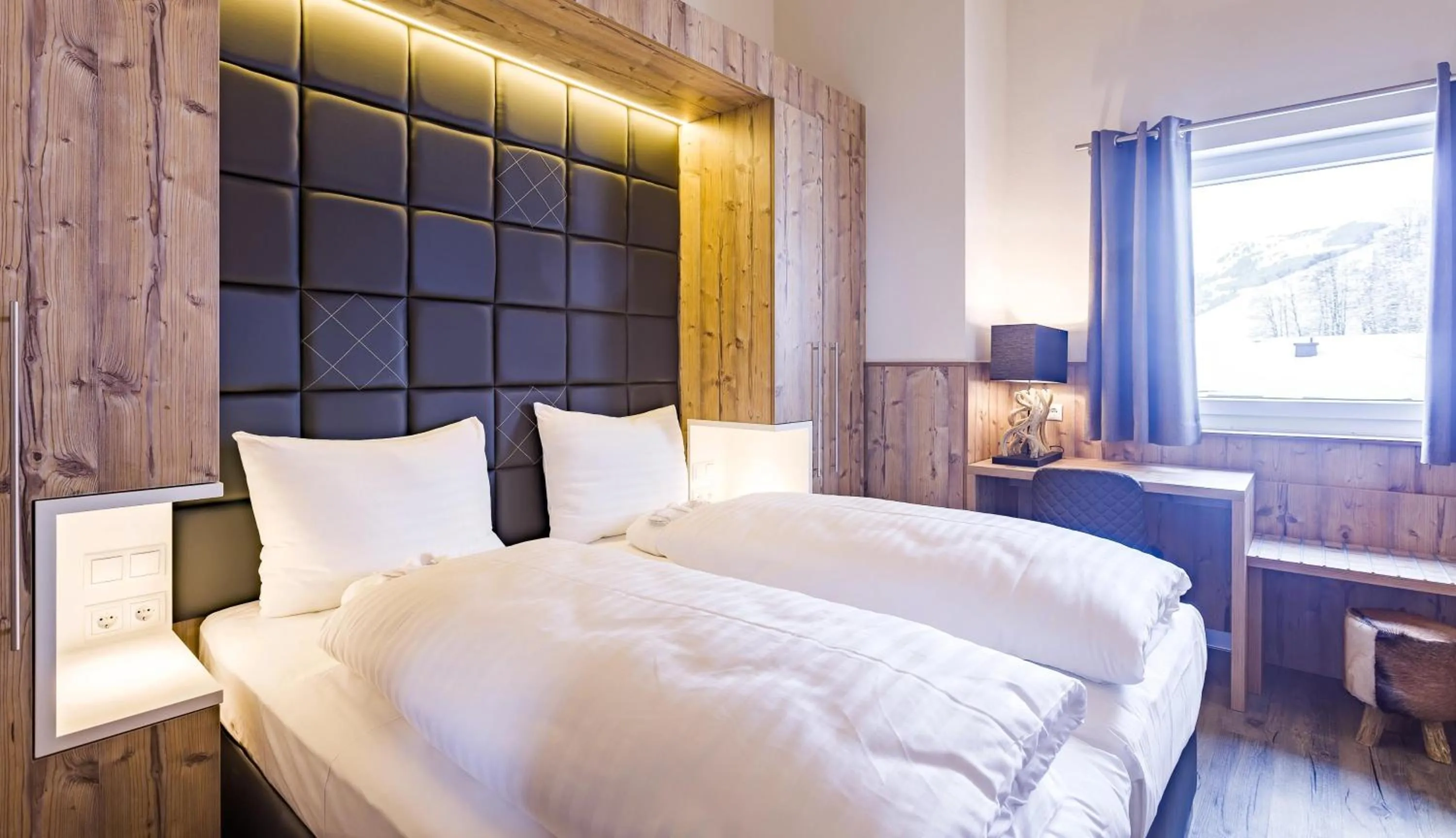 Bedroom, Bed in AvenidA Mountain Lodges Saalbach