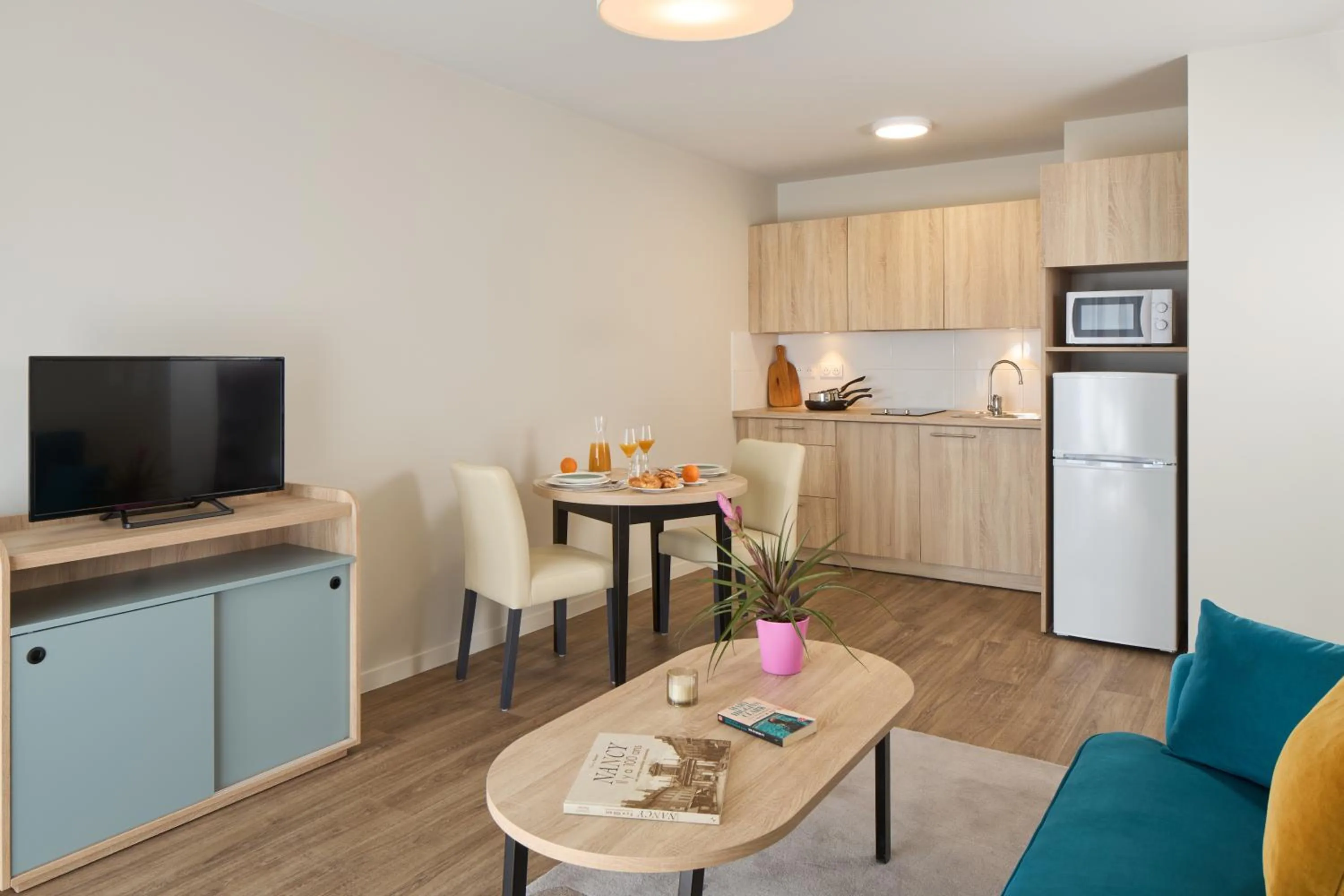 Communal lounge/ TV room in Zenitude Quality Aparthotel Nancy Centre