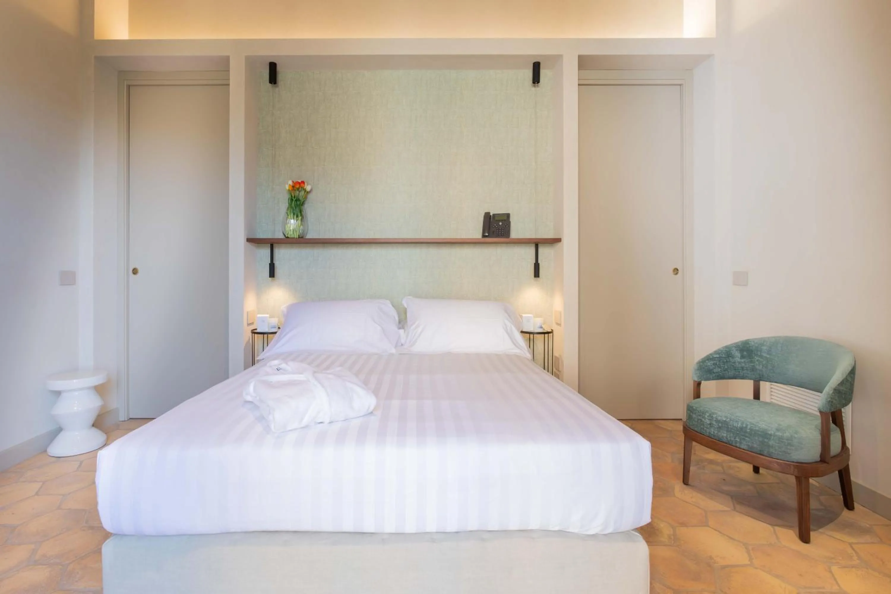 Bed in Relais La Colombaia