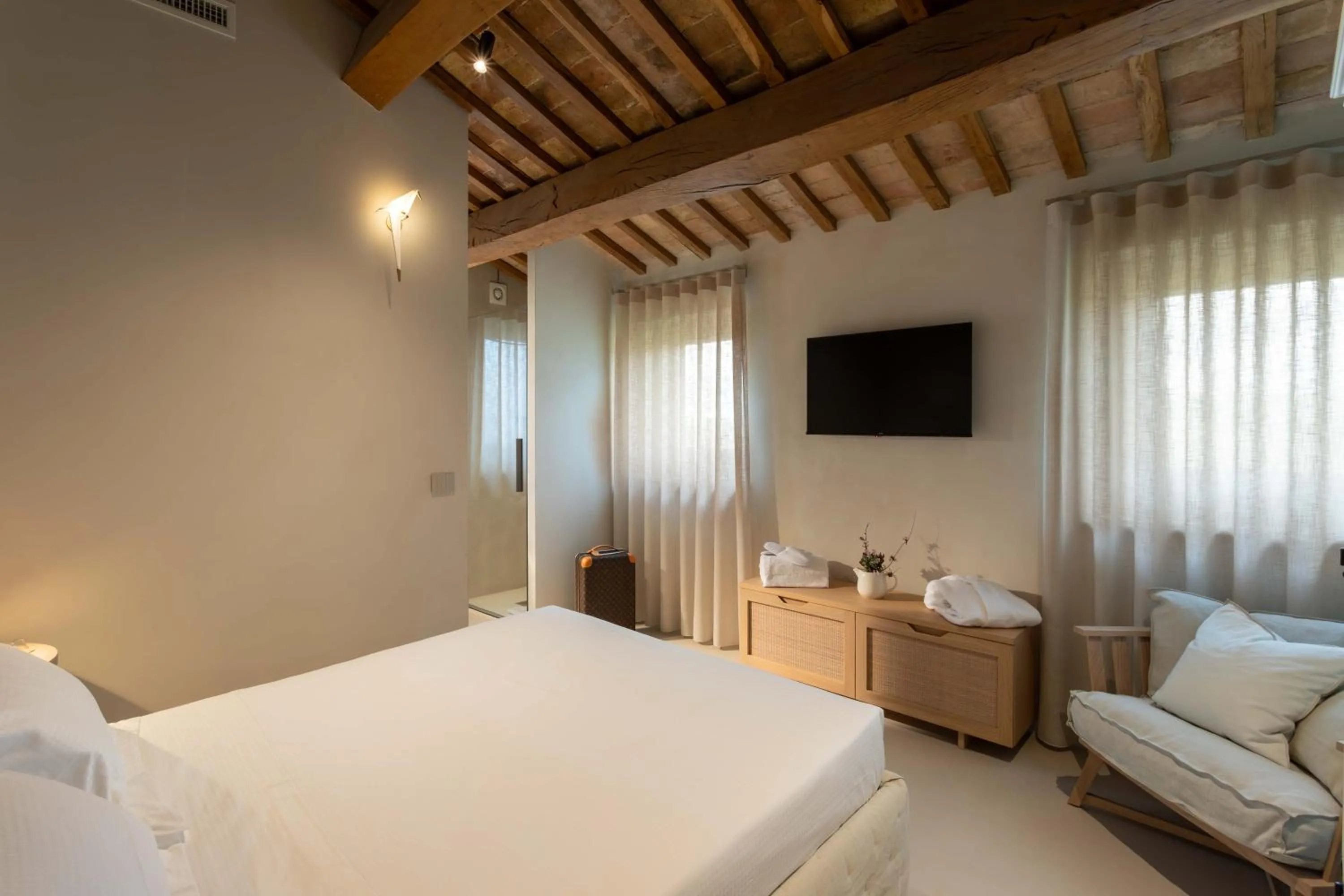Bed in Relais La Colombaia