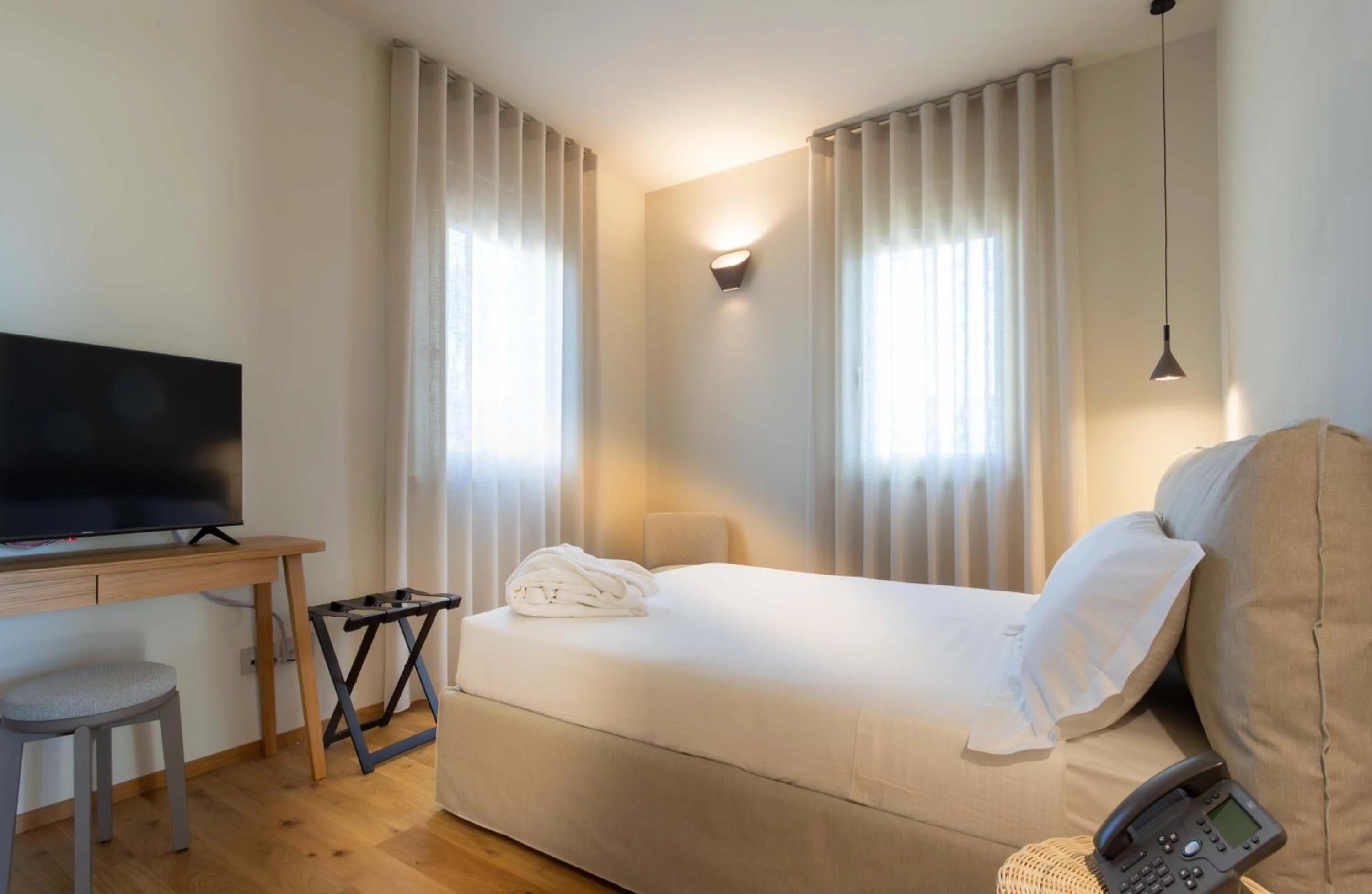 Bed in Relais La Colombaia