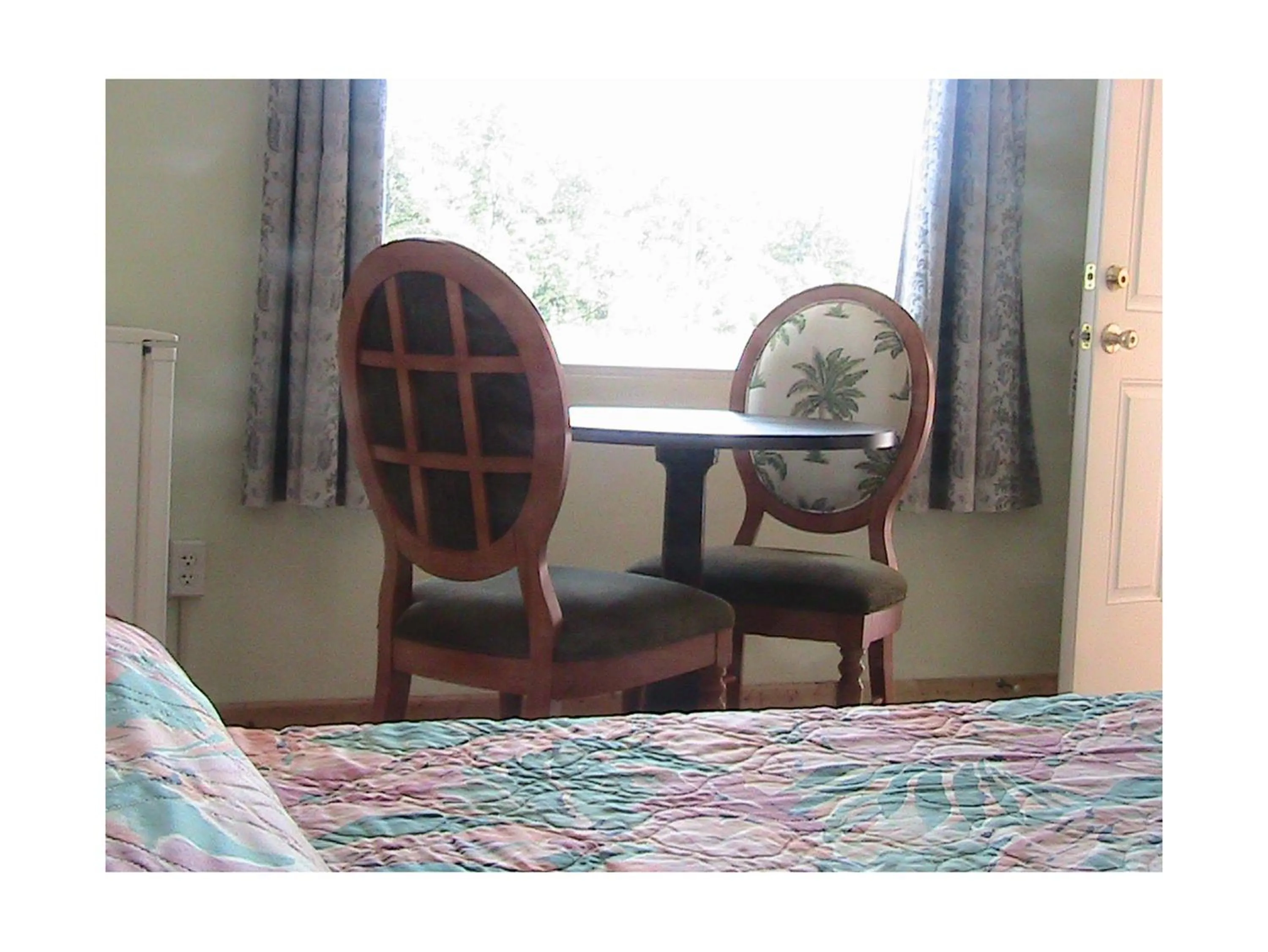 Seating area in At Home Express Tangerine Inn