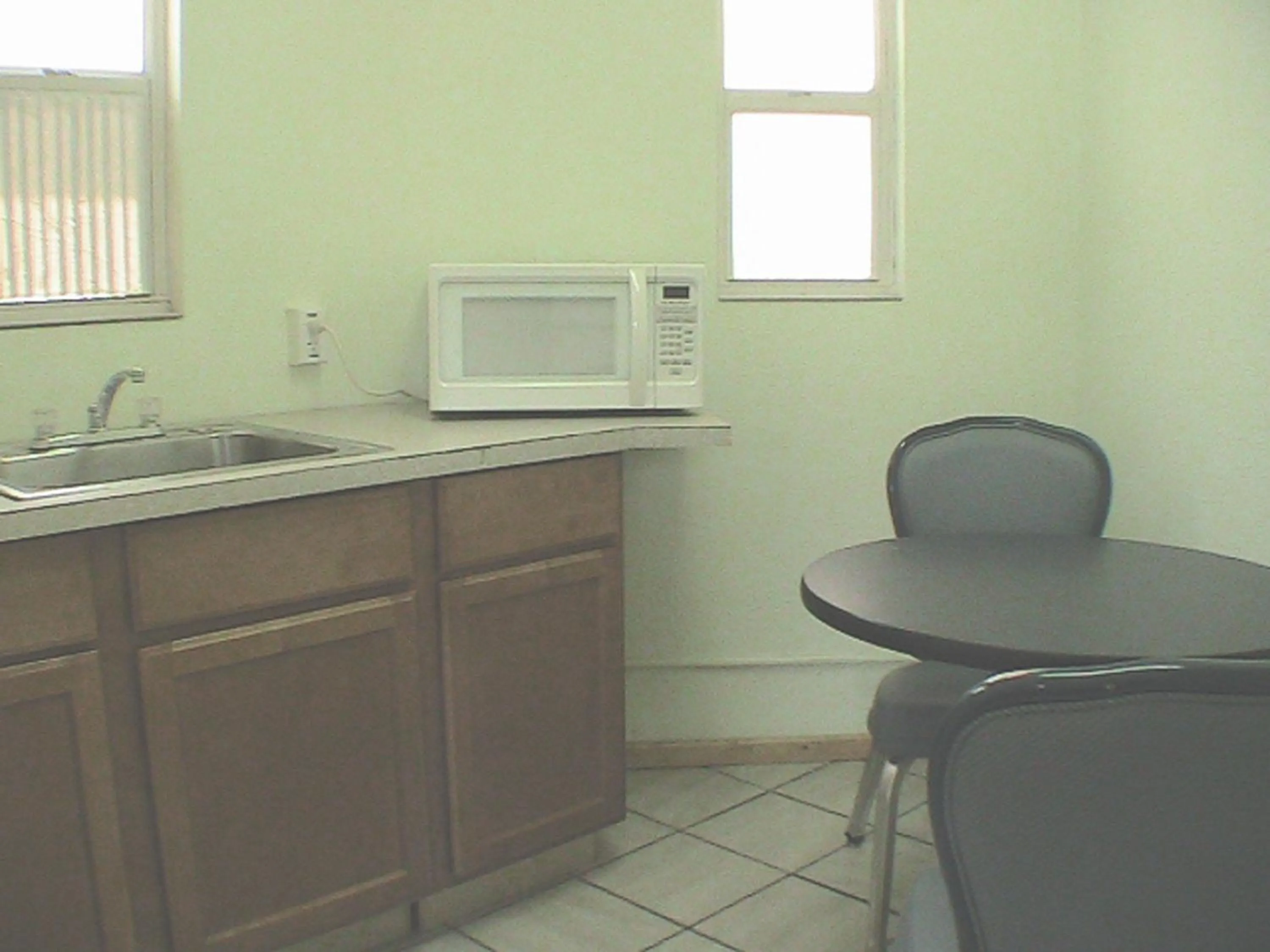 Kitchen or kitchenette in At Home Express Tangerine Inn