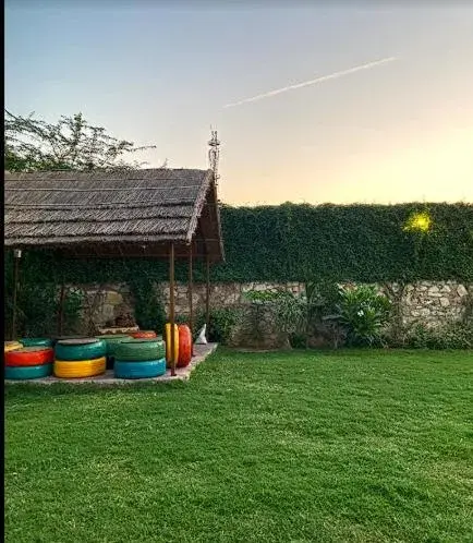 Garden view in The Bagh Village Resort & Spa Garden view in The Bagh Village Resort & Spa