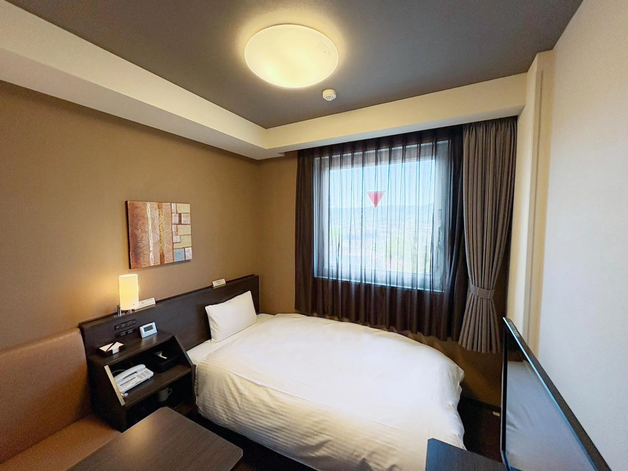 Photo of the whole room, Bed in Hotel Route Inn Annaka