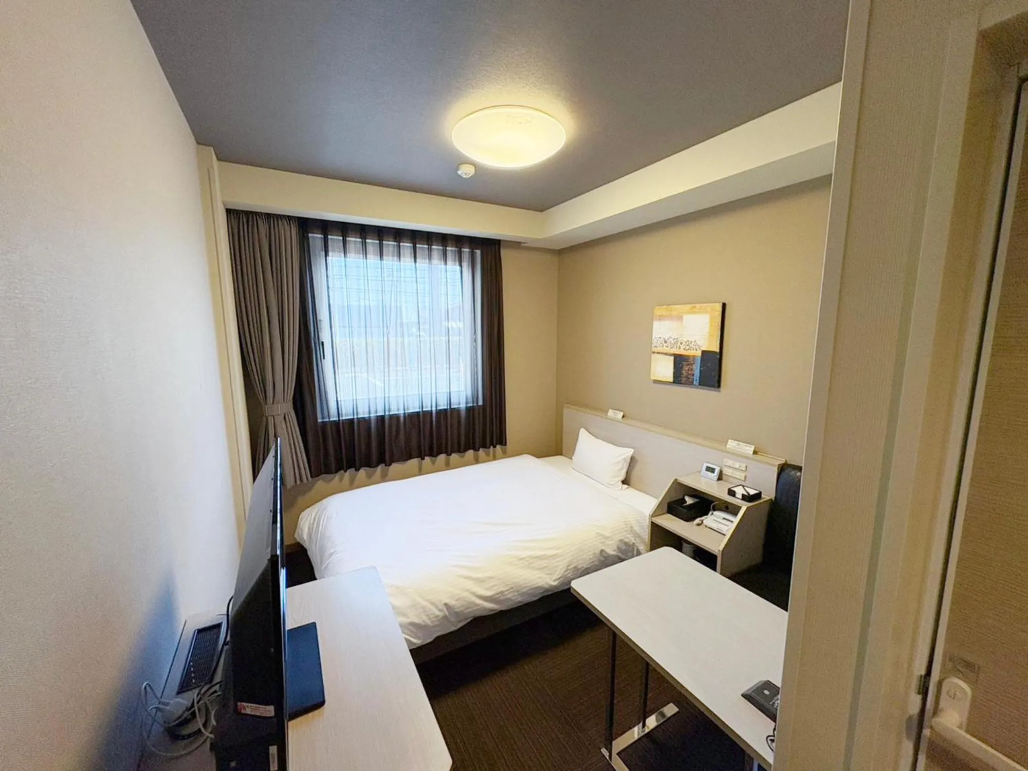 Photo of the whole room, Bed in Hotel Route Inn Annaka