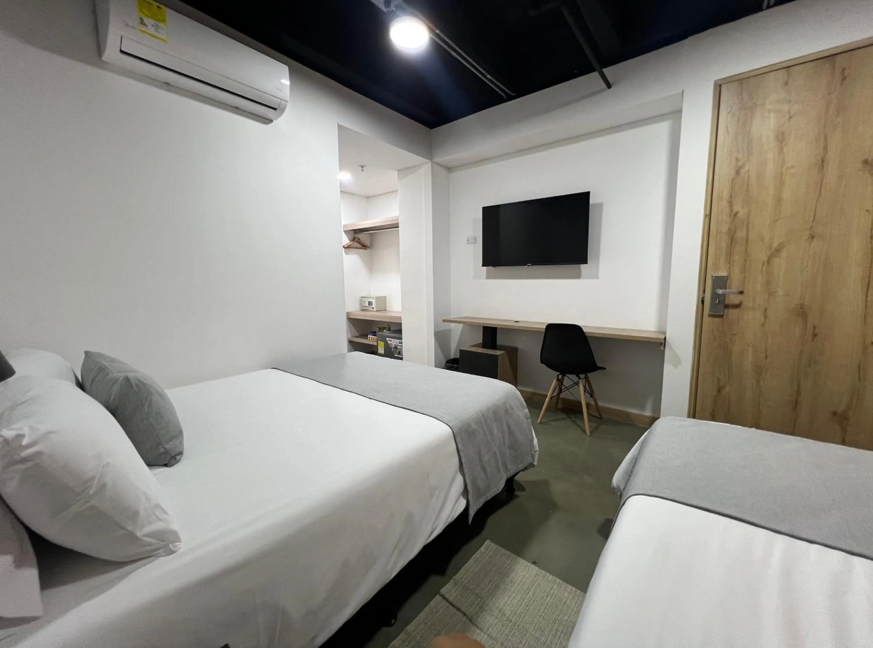 Bed in Akela Park Hotel