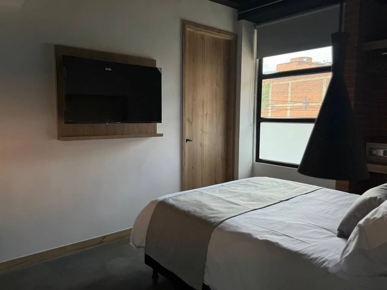 Bed in Akela Park Hotel