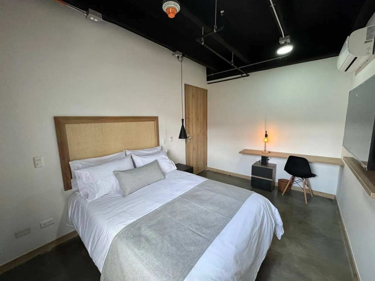 Bed in Akela Park Hotel