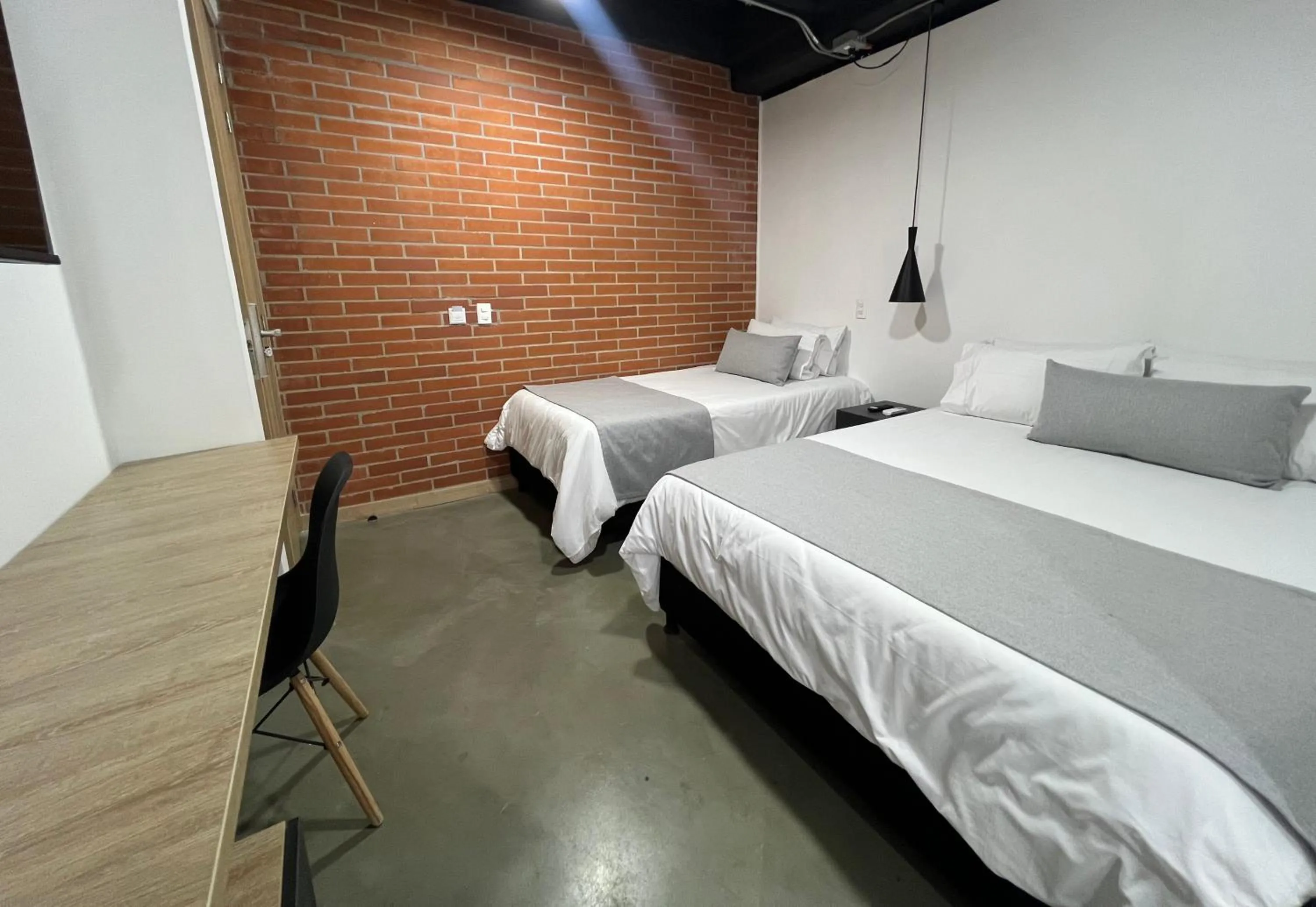 Bed in Akela Park Hotel