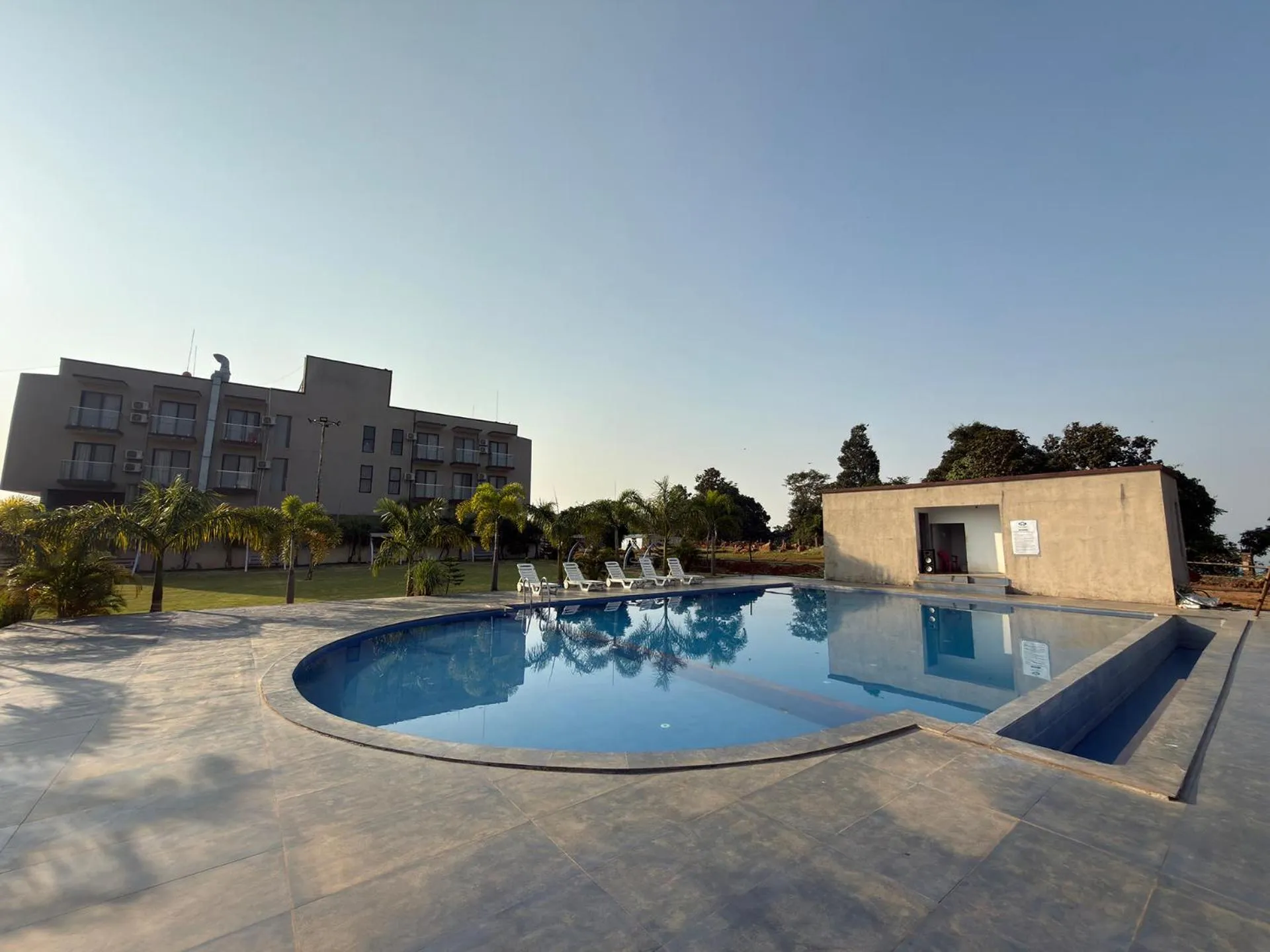 Swimming pool in Daksh The Valley Resort - Saputara