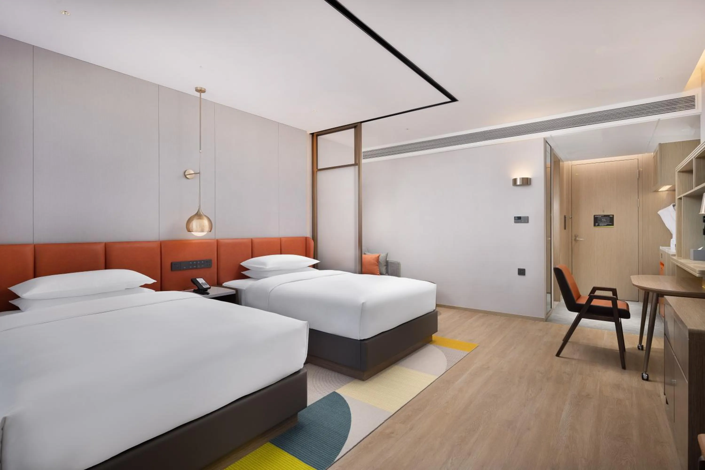 Bed in Home2 Suite by Hilton Kunming Xishan