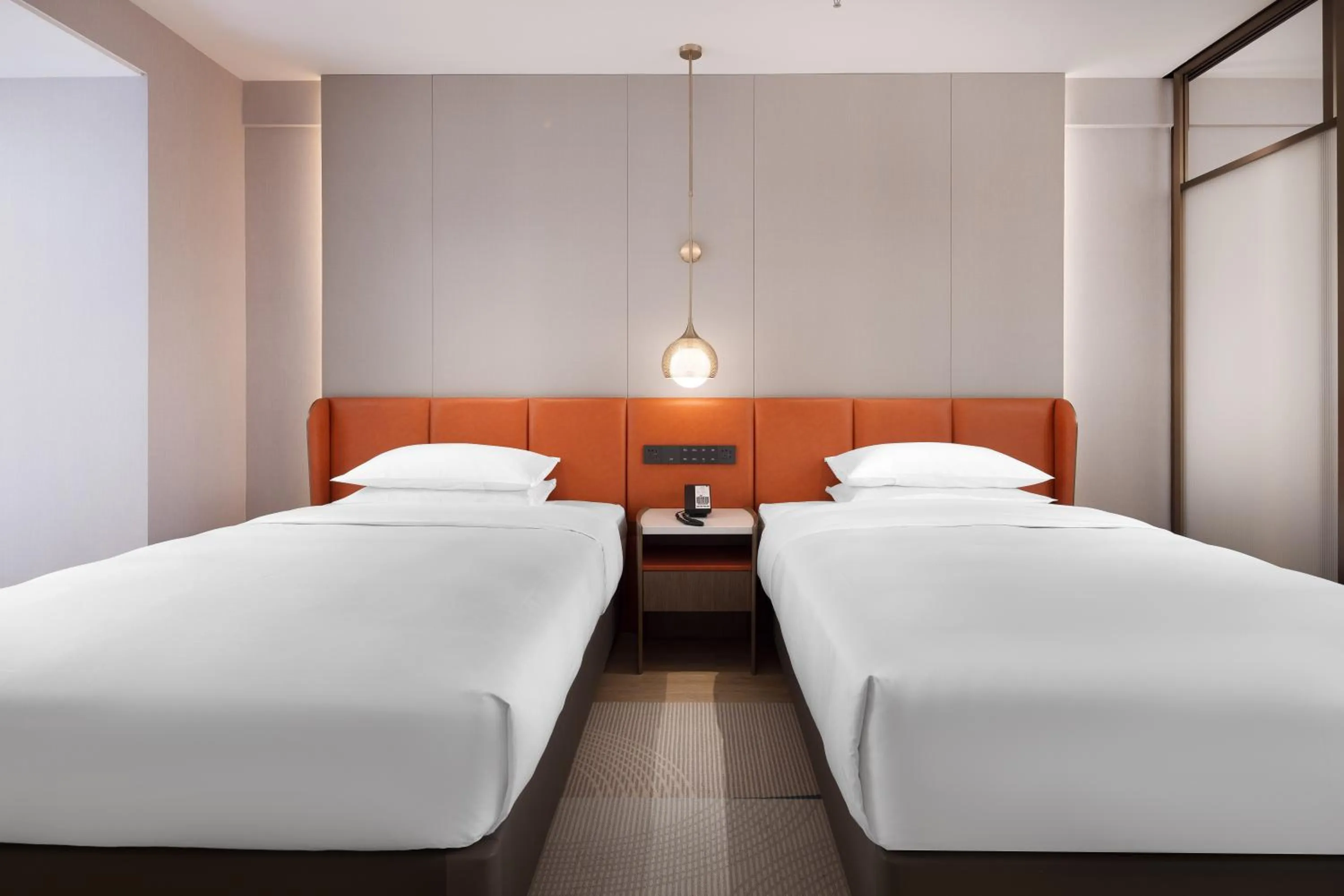 Bed in Home2 Suite by Hilton Kunming Xishan