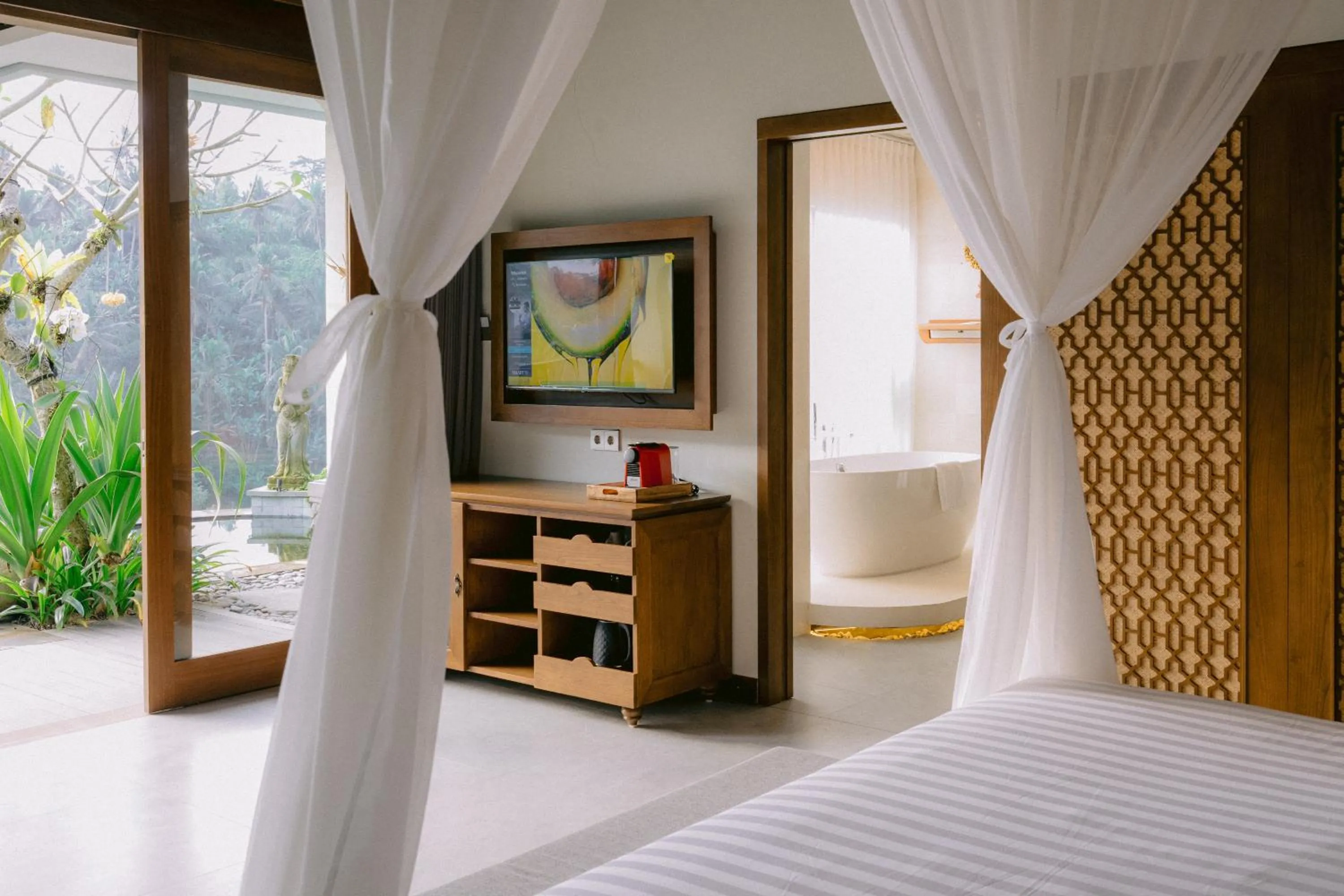 Bed in Sanggraloka Ubud