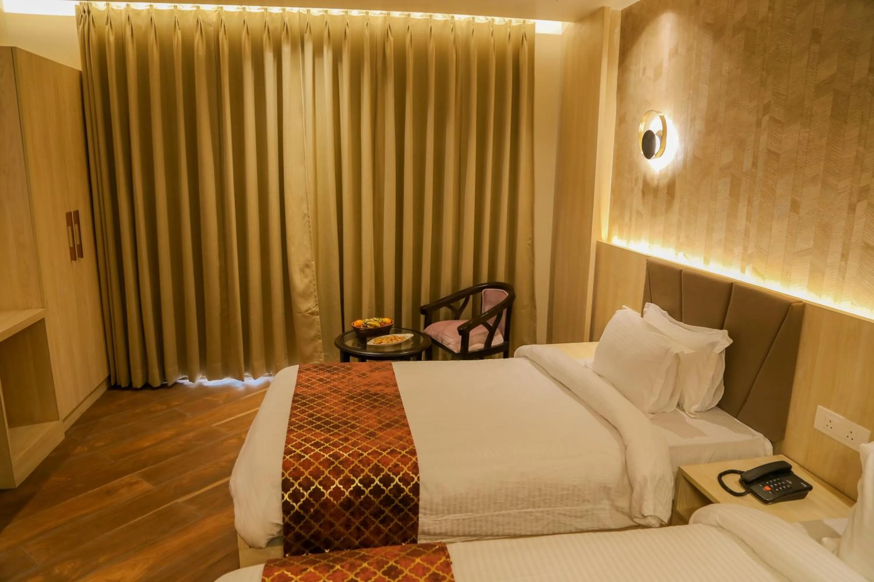 Bed in Four Leaf Hotel Arjuna Manor, Varanasi