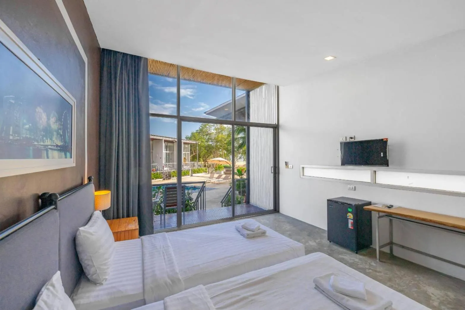 Bed in Sunset Serenity Jomtien Resort