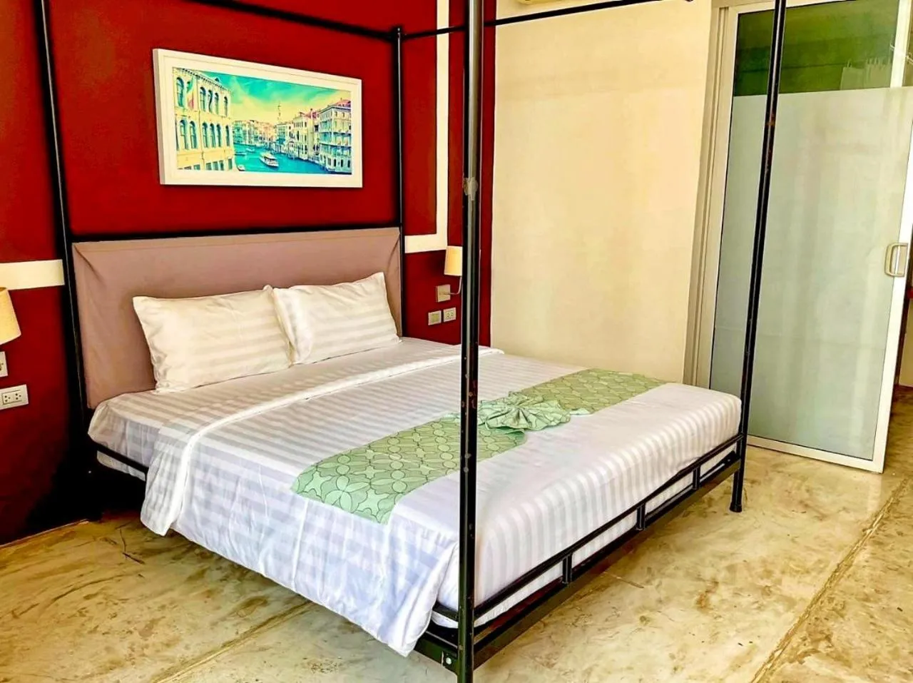 Bed in Sunset Serenity Jomtien Resort