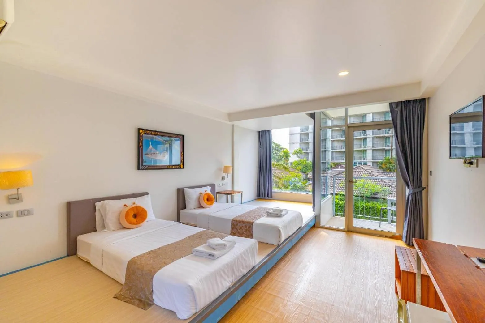 Bed in Sunset Serenity Jomtien Resort