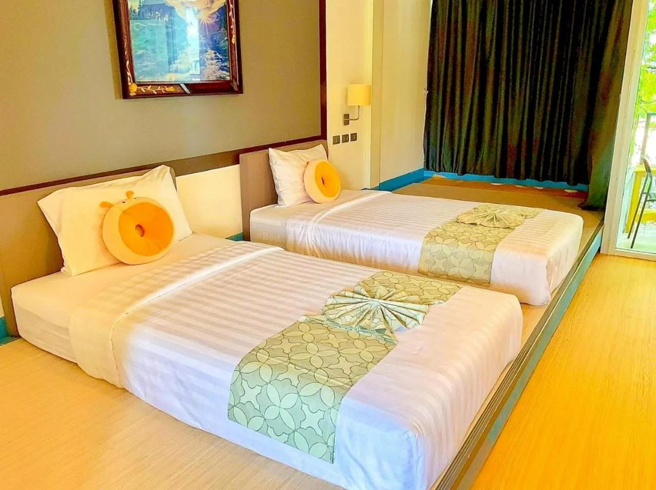 Bed in Sunset Serenity Jomtien Resort