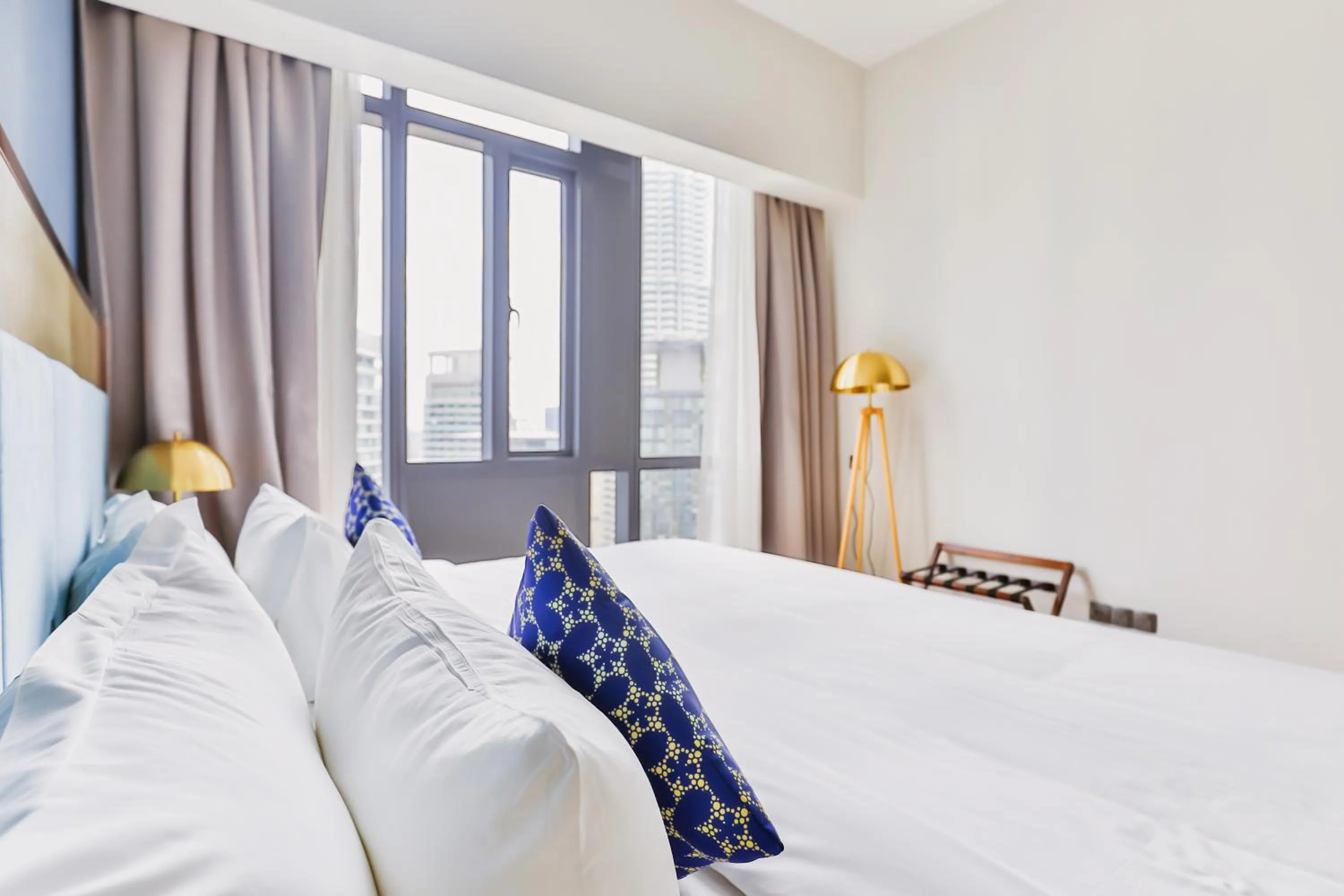 Bed in Star Deluxe Suites KLCC by WSD