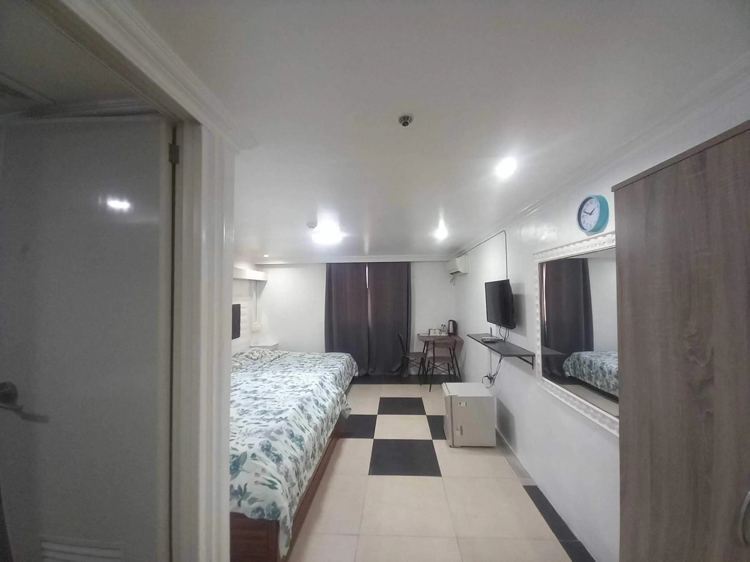 Bedroom in OYO 1141 Healing Condo Hotel