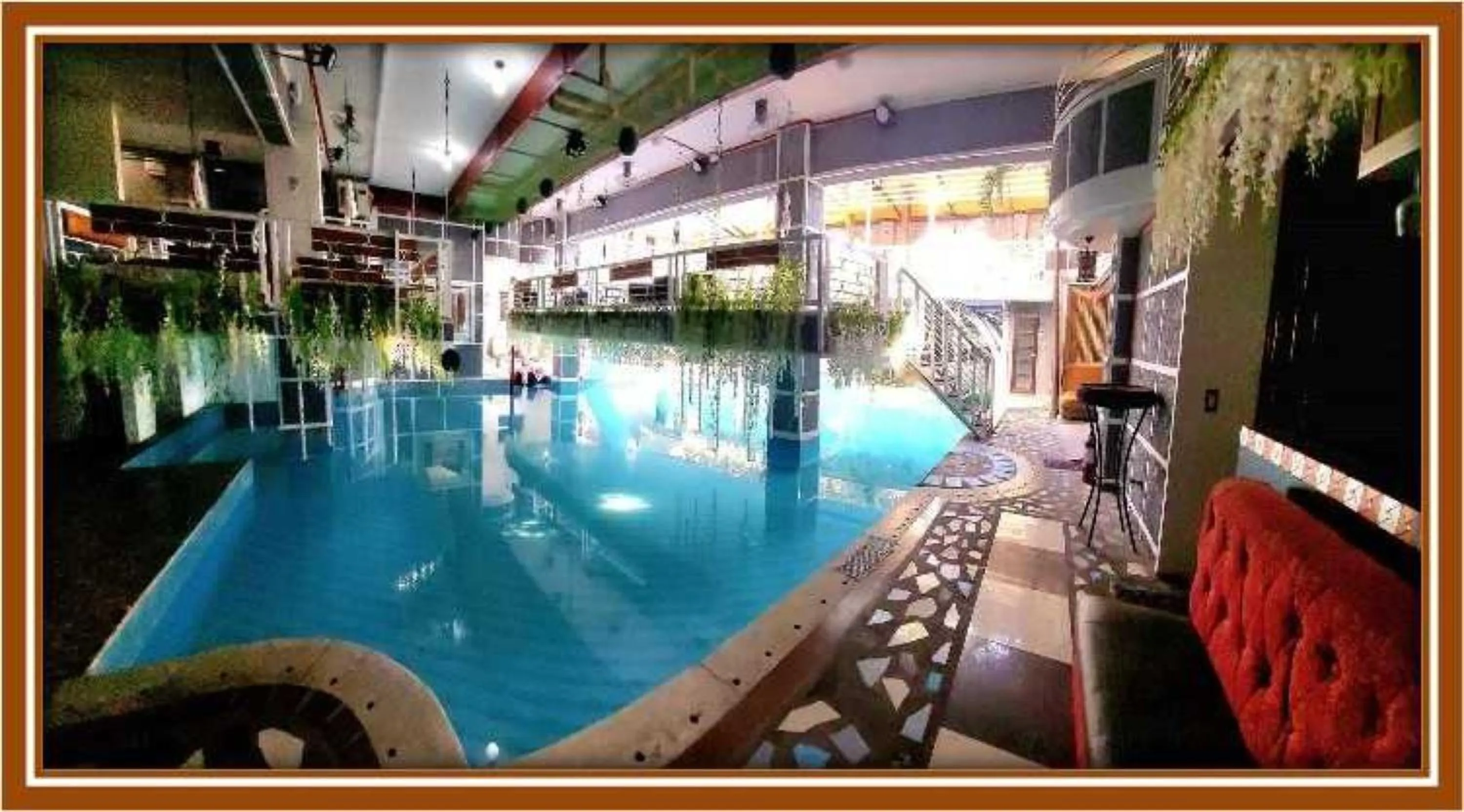Swimming pool in OYO 1141 Healing Condo Hotel