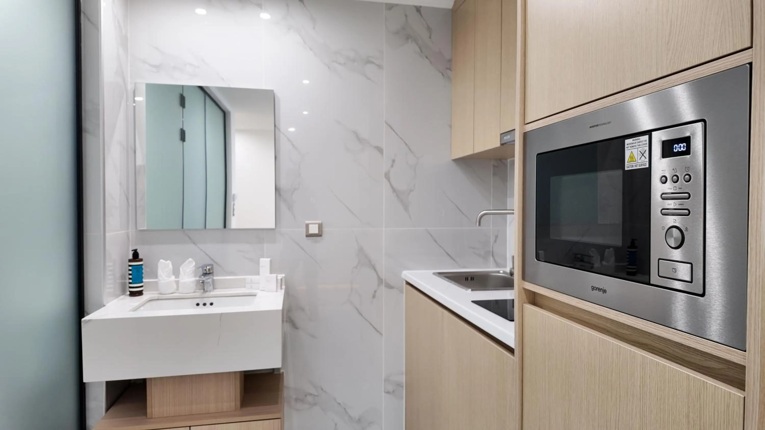 Kitchen or kitchenette in CC LUX Suites in Piraeus Port