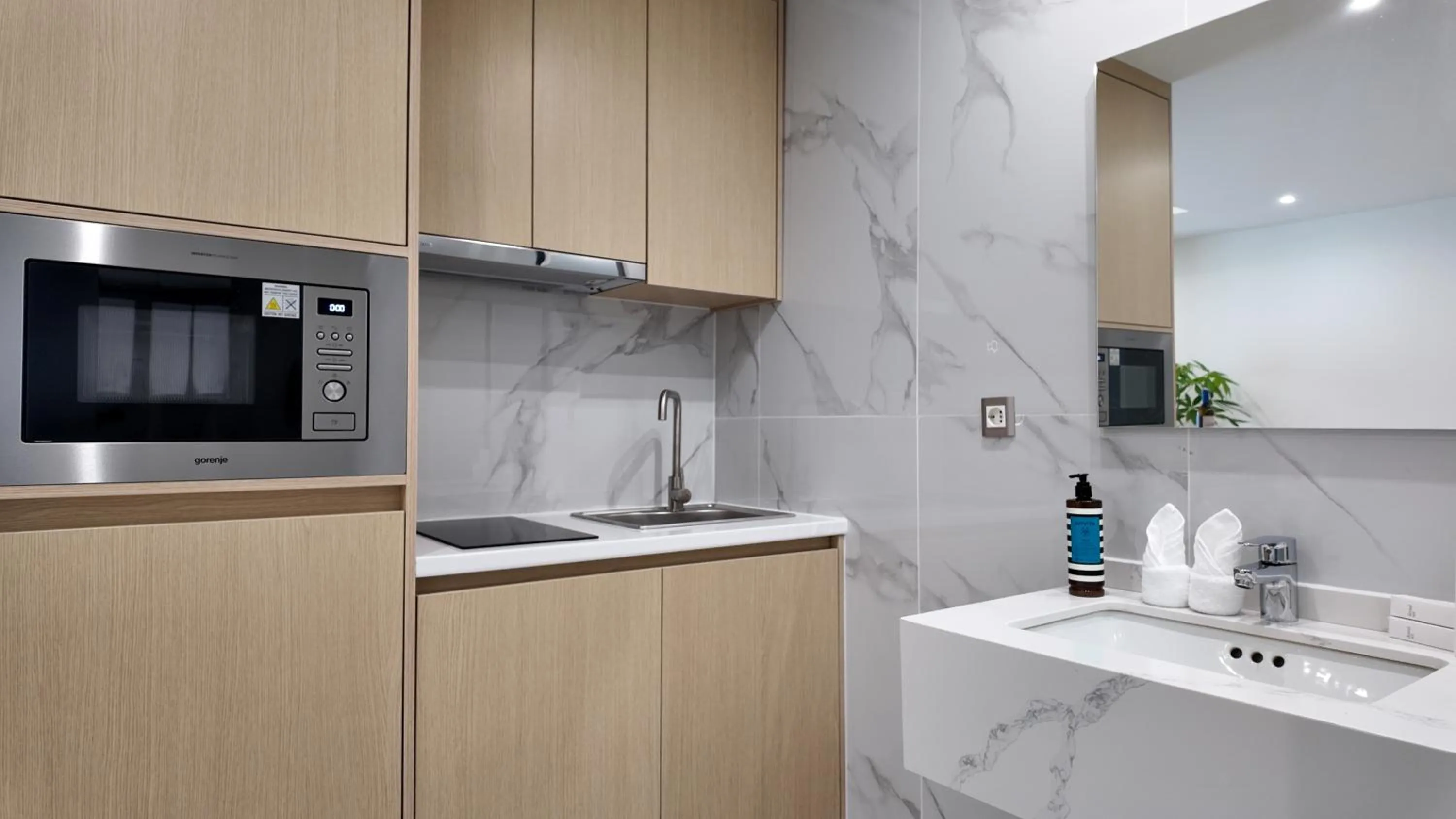 Kitchen or kitchenette in CC LUX Suites in Piraeus Port