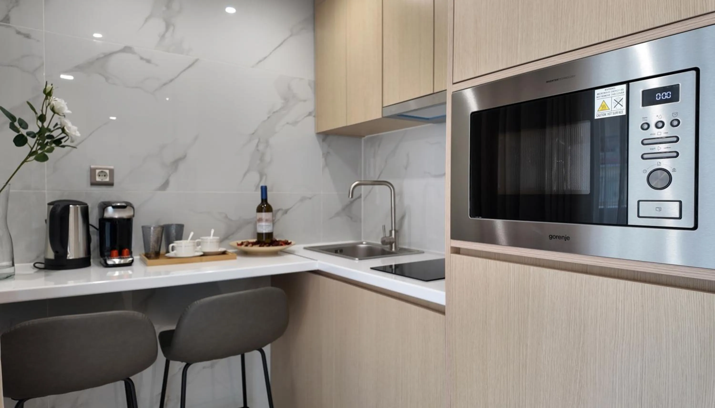 Kitchen or kitchenette in CC LUX Suites in Piraeus Port