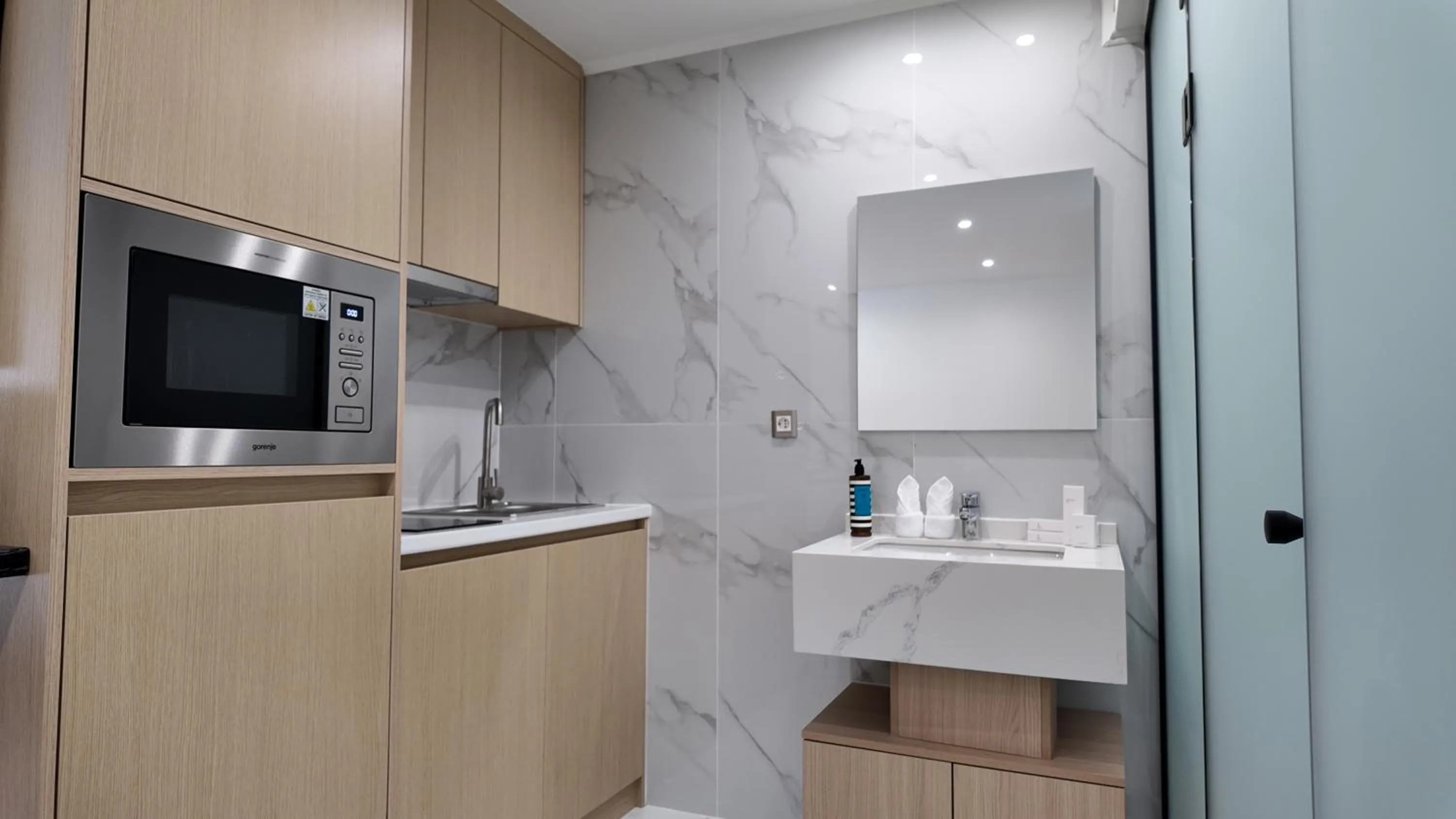 Kitchen or kitchenette in CC LUX Suites in Piraeus Port